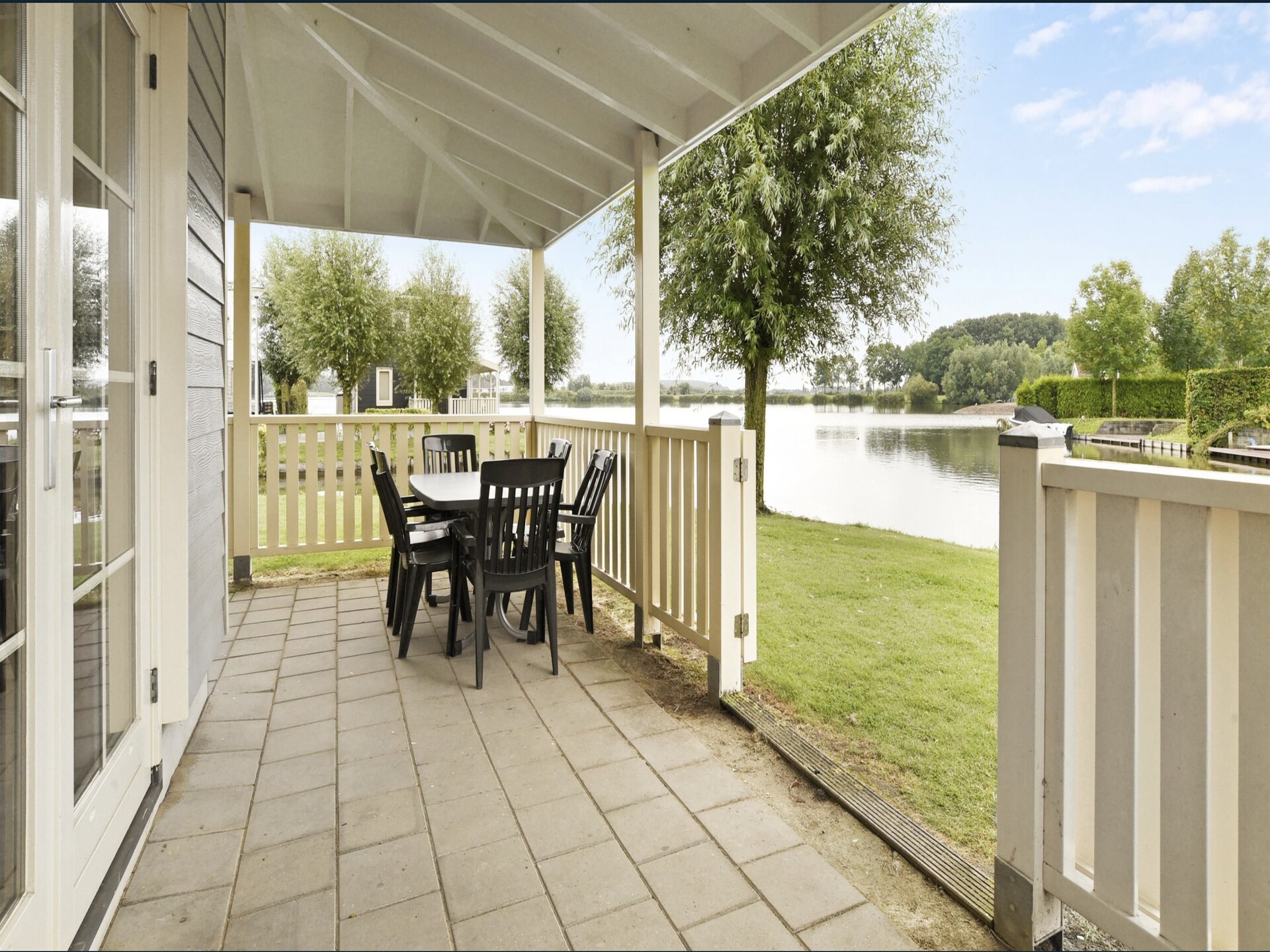 Luxe vakantiehuis aan het water met sauna op park Zuytland Buiten - foto 14