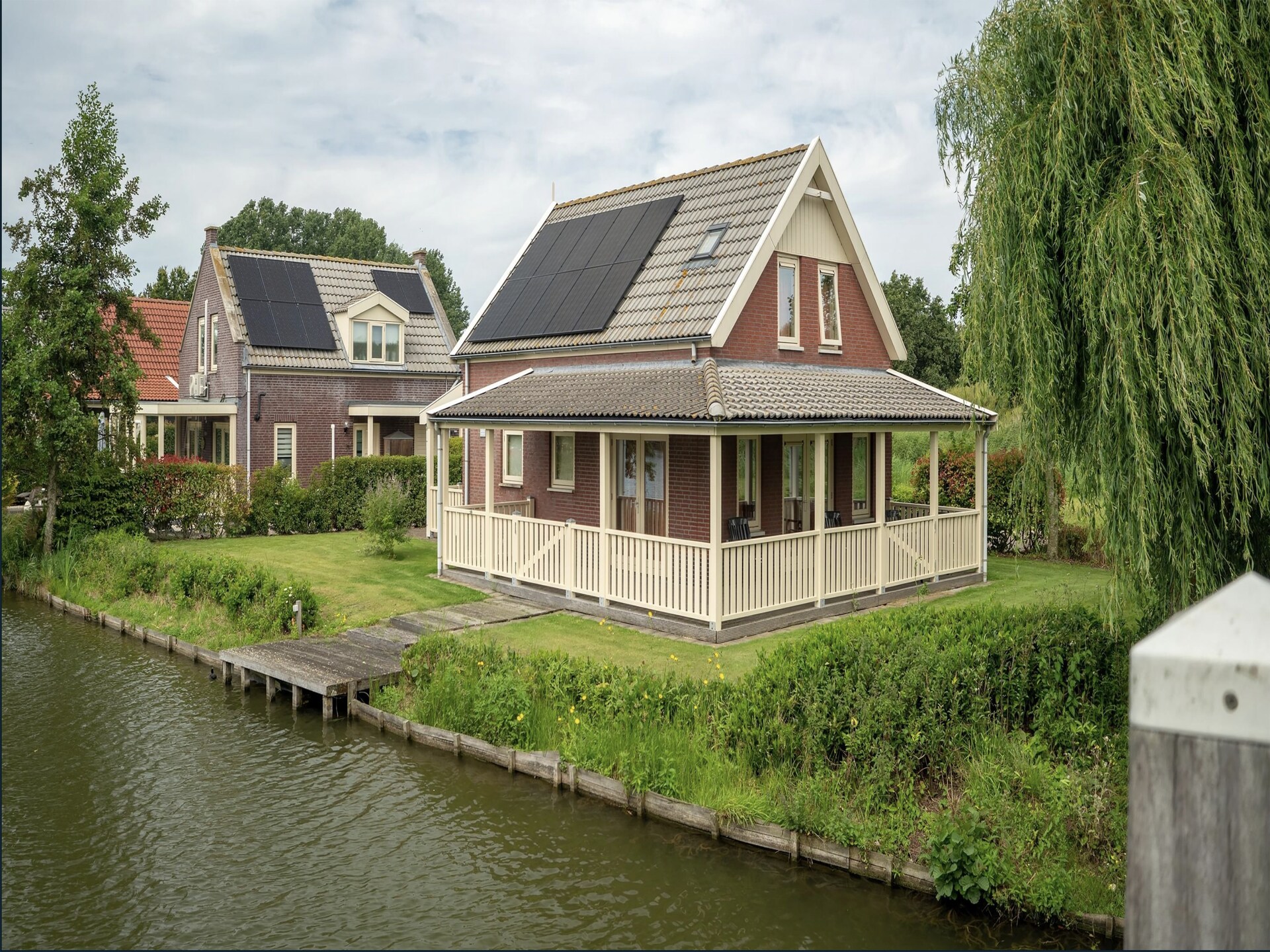 Luxe vakantiehuis aan het water met sauna op park Zuytland Buiten - foto 9