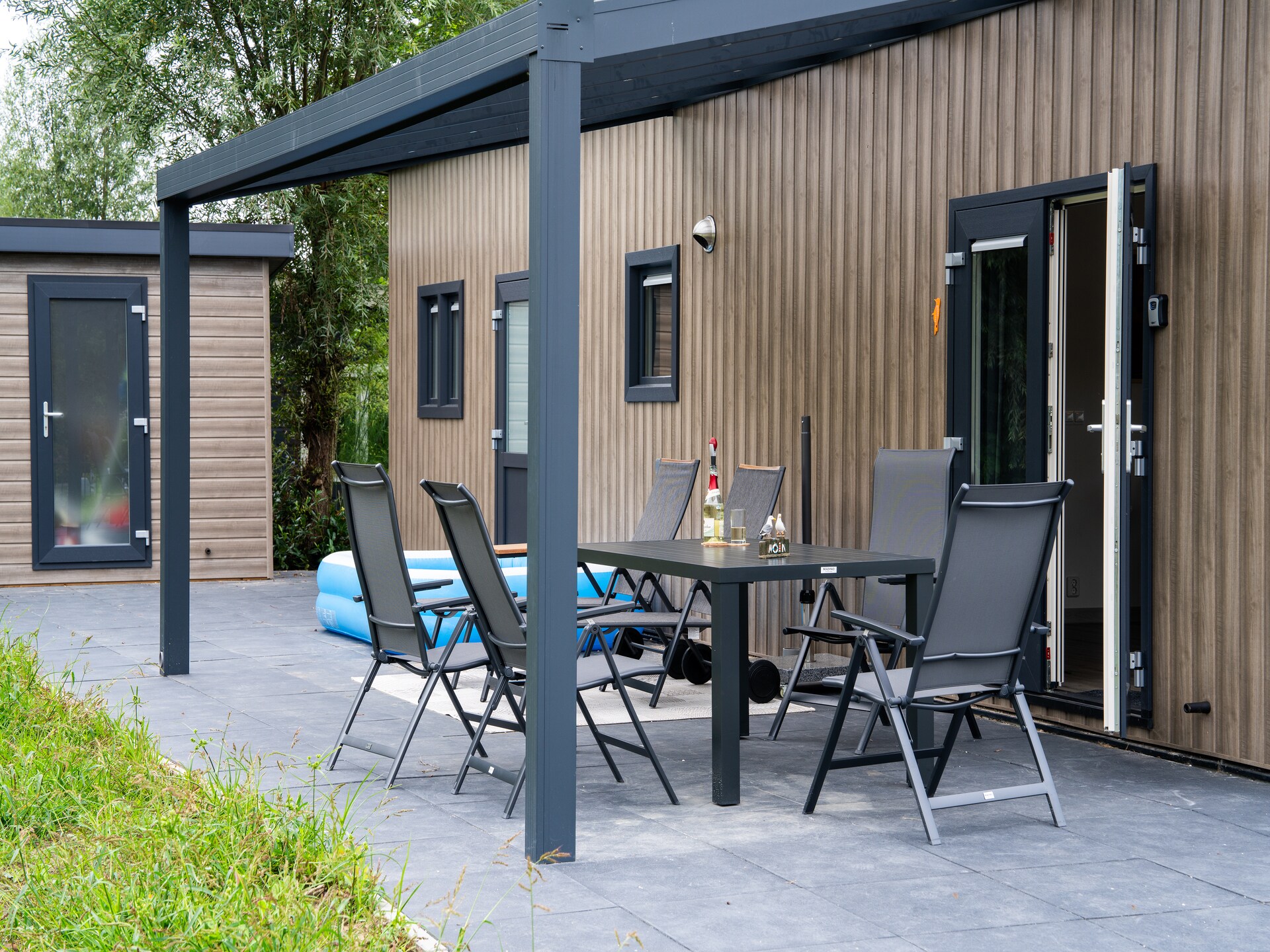 Knus vrijstaand vakantiehuis in Brabant met omheinde tuin aan de golfbaan - foto 11