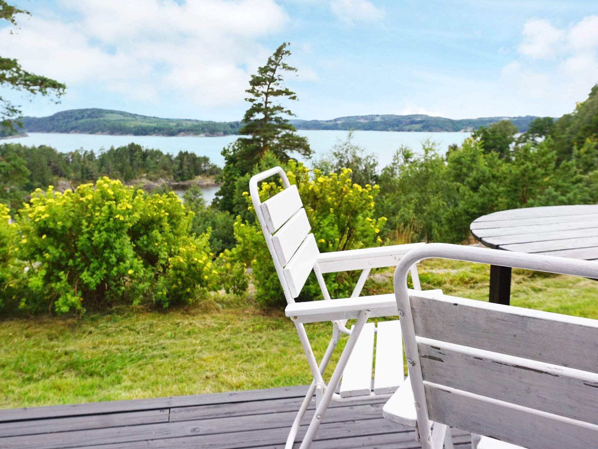 Zweeds vakantiehuis met panoramisch fjordzicht bij kindvriendelijk zandstrand - foto 7