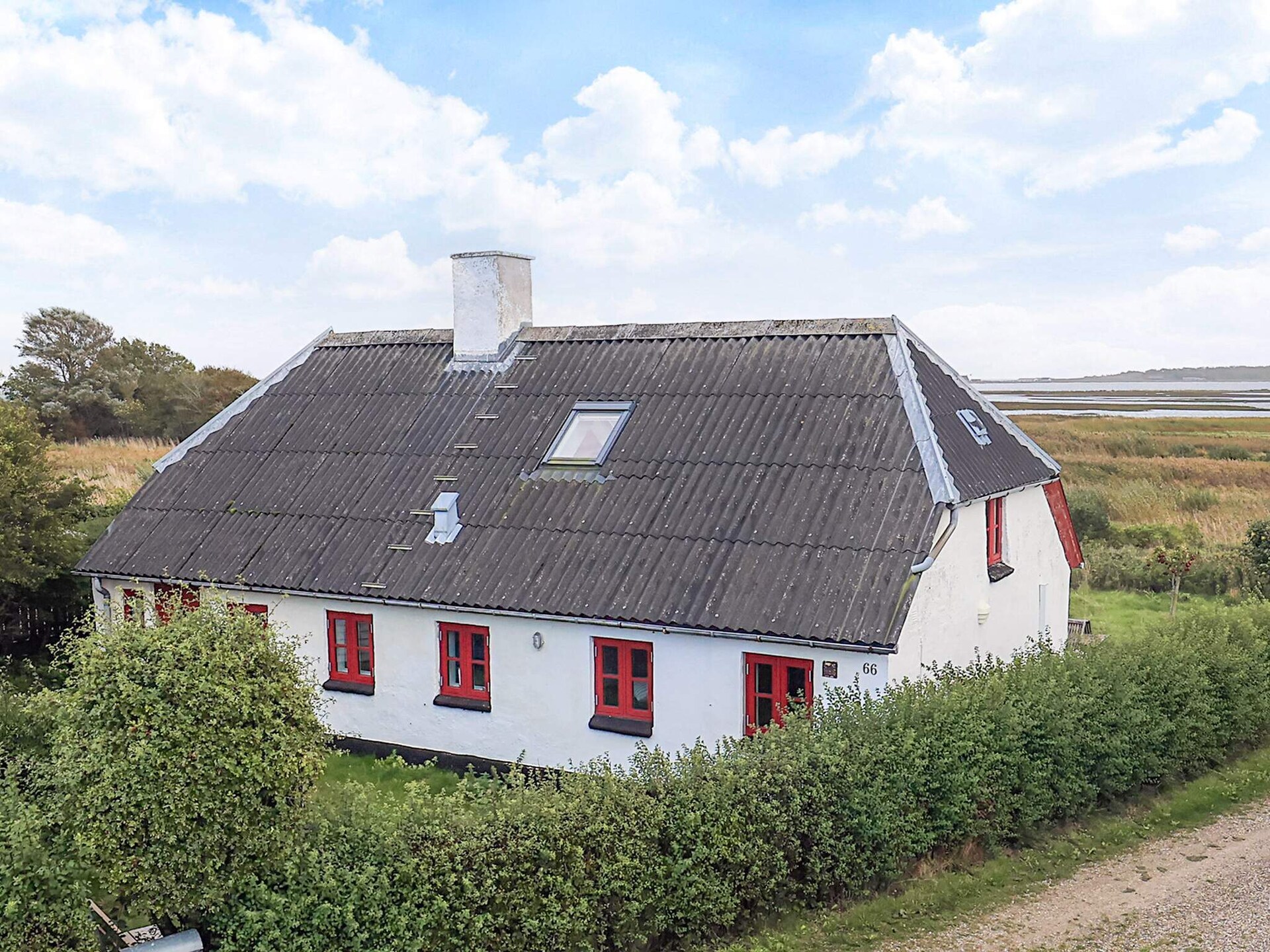 Authentiek vissershuisje aan het Limfjord met weids waterzicht - foto 1
