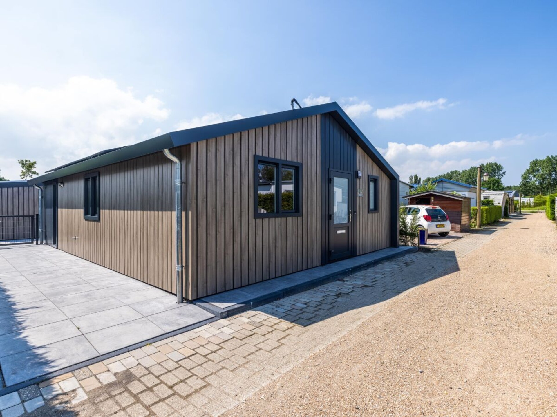 Luxe 6-persoons chalet aan vaarwater in Wervershoof met omheinde tuin - foto 5