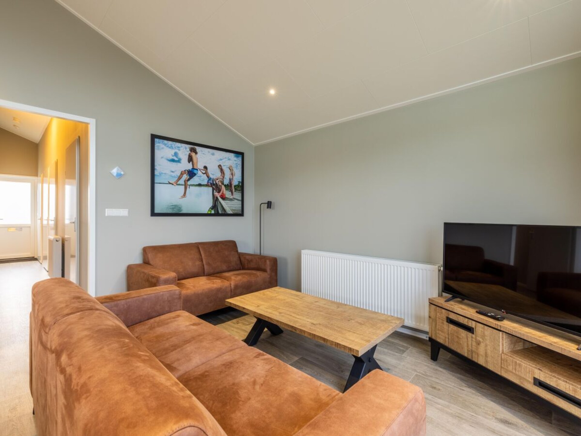 Luxe 6-persoons chalet aan vaarwater in Wervershoof met omheinde tuin - foto 9