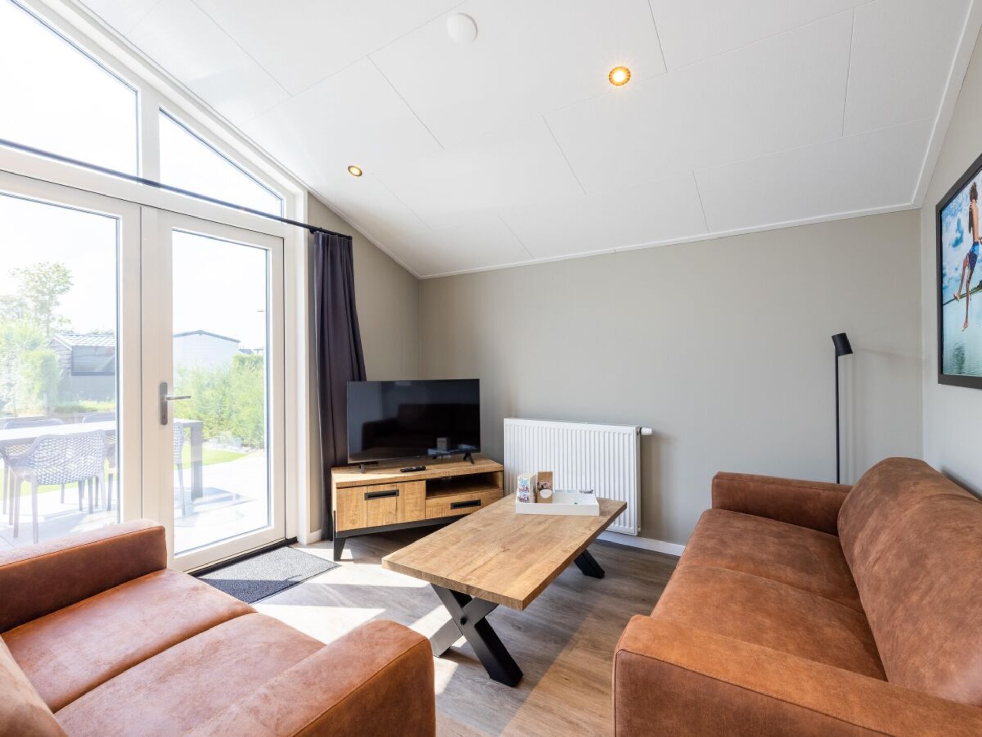 Luxe 6-persoons chalet aan vaarwater in Wervershoof met omheinde tuin - foto 13