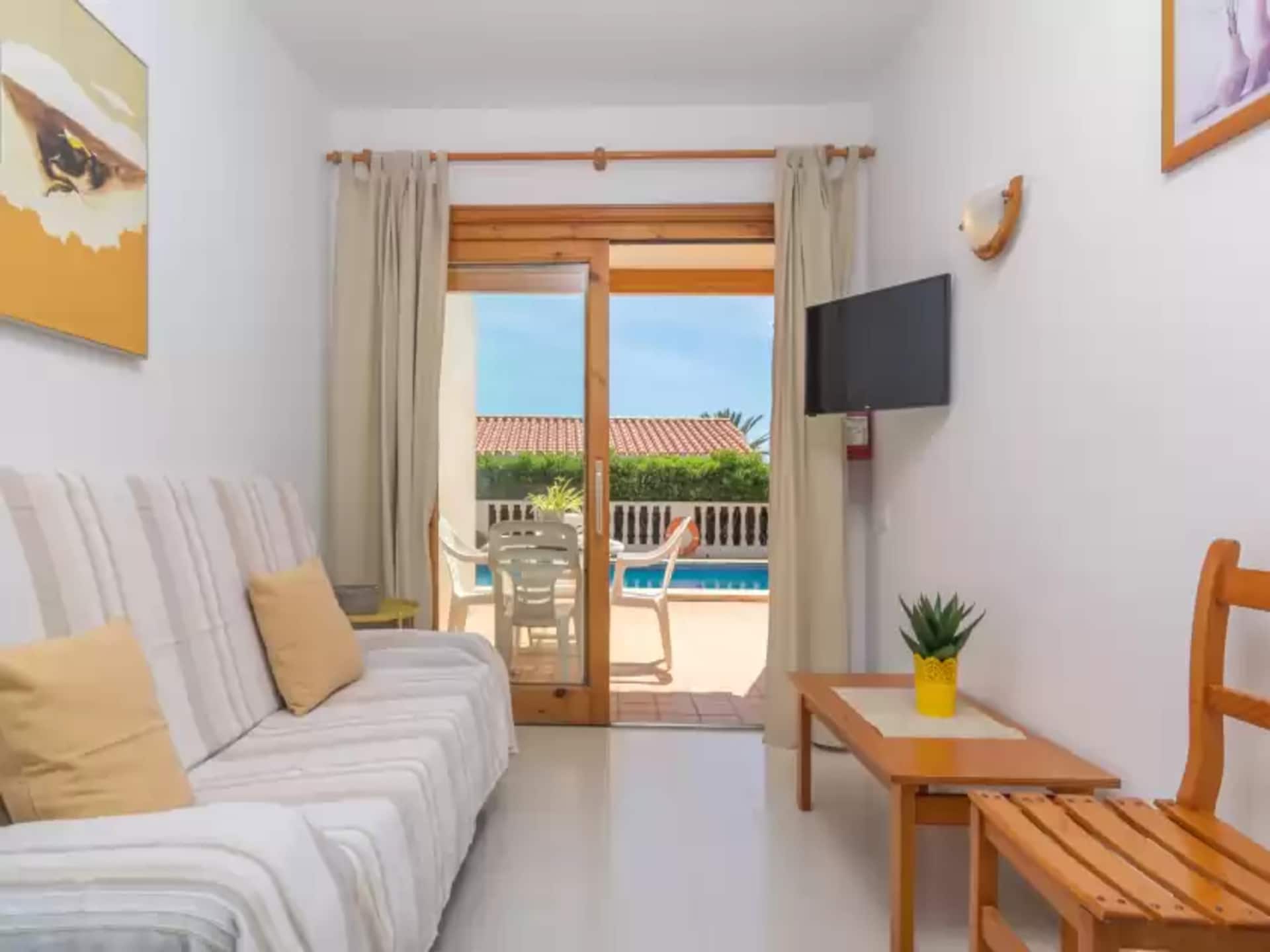 Gezellig appartement met gedeeld zwembad aan de golfbaan in Cala en Porter - foto 11