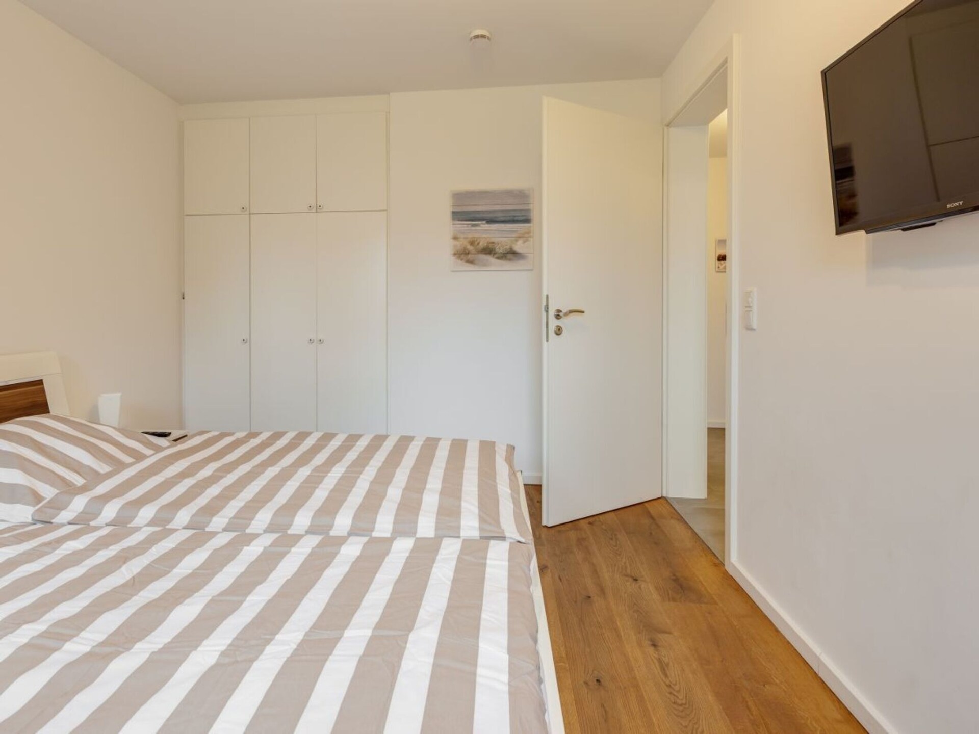 Licht appartement op de begane grond met terras en strandstoel in Westerland - foto 10