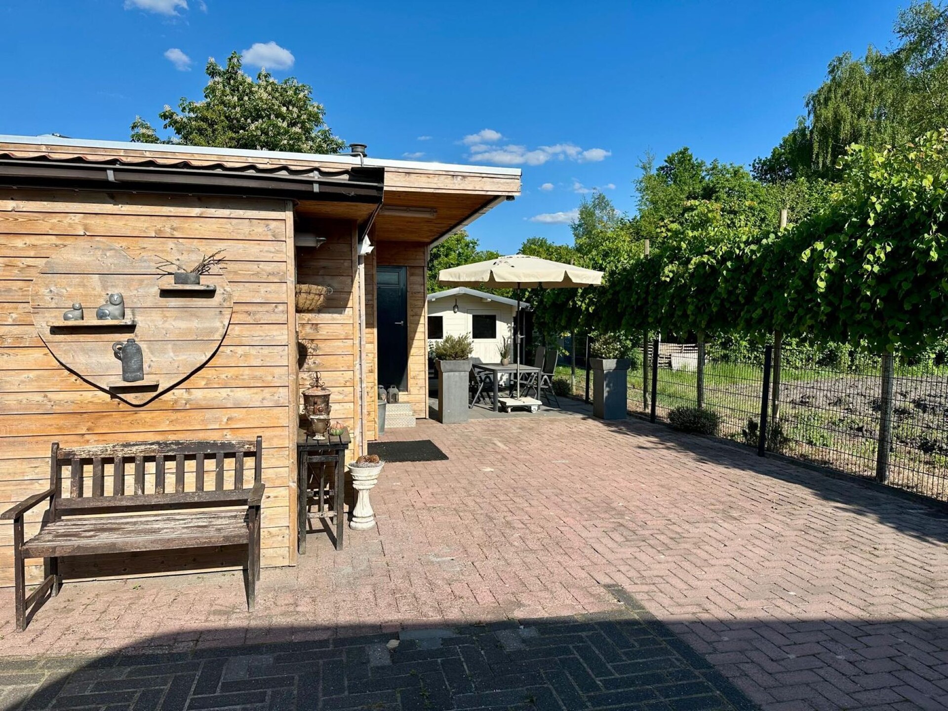 Vrijstaand vakantiehuis met tuin aan de golfbaan in Elim, Drenthe - foto 7