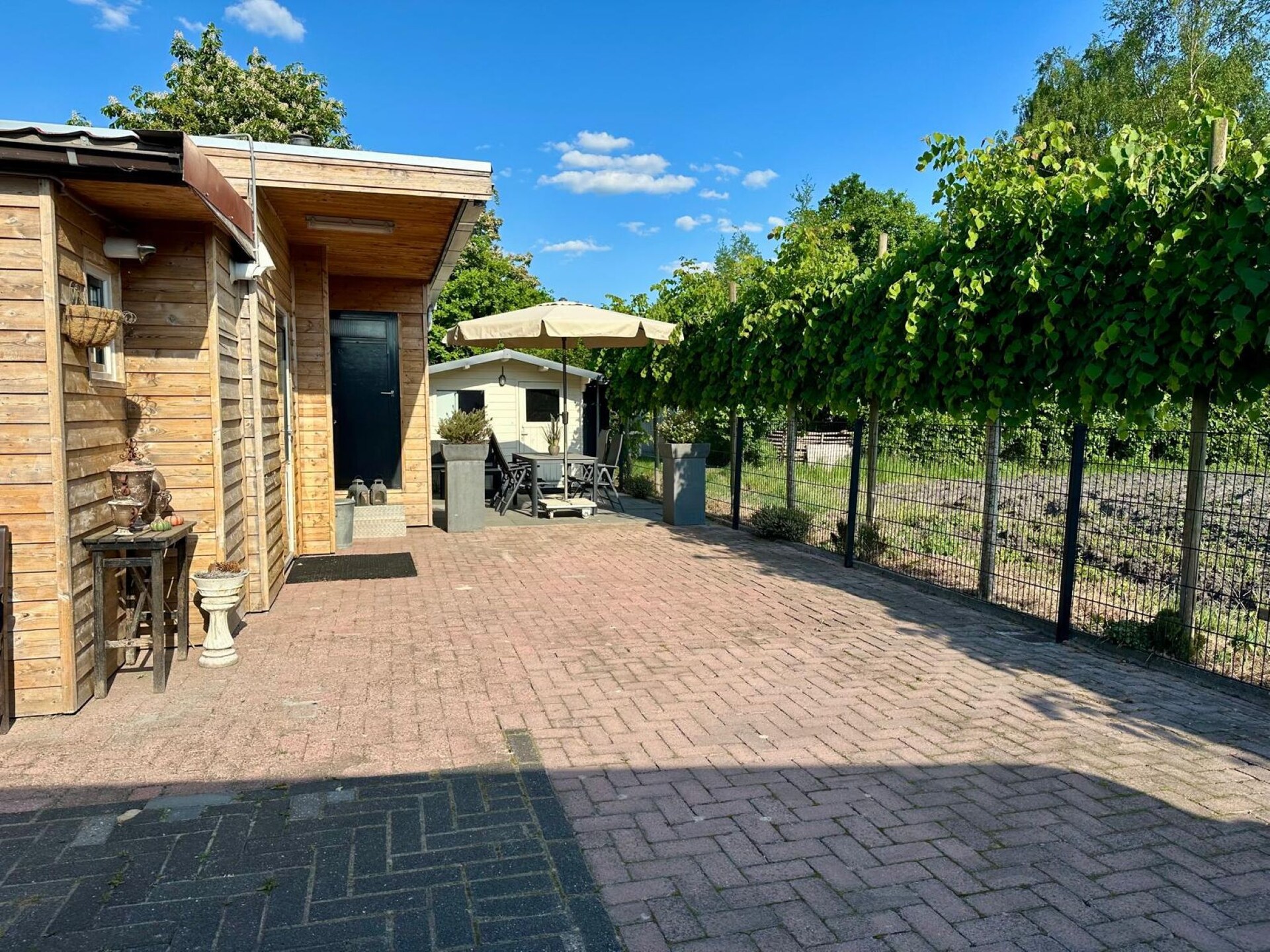 Vrijstaand vakantiehuis met tuin aan de golfbaan in Elim, Drenthe - foto 14