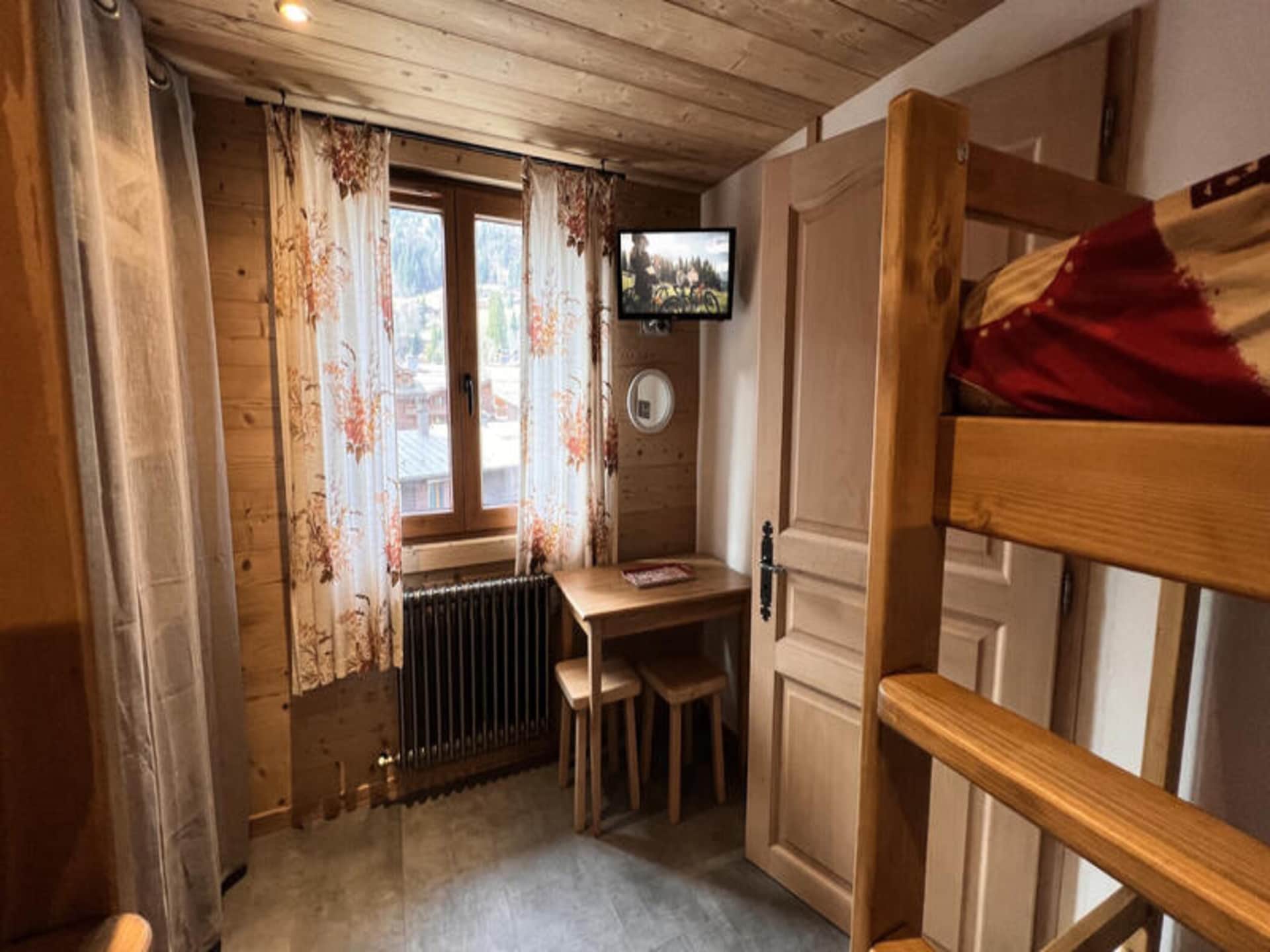 Gerenoveerd 8-persoons appartement op 100m van de piste in La Clusaz - foto 11