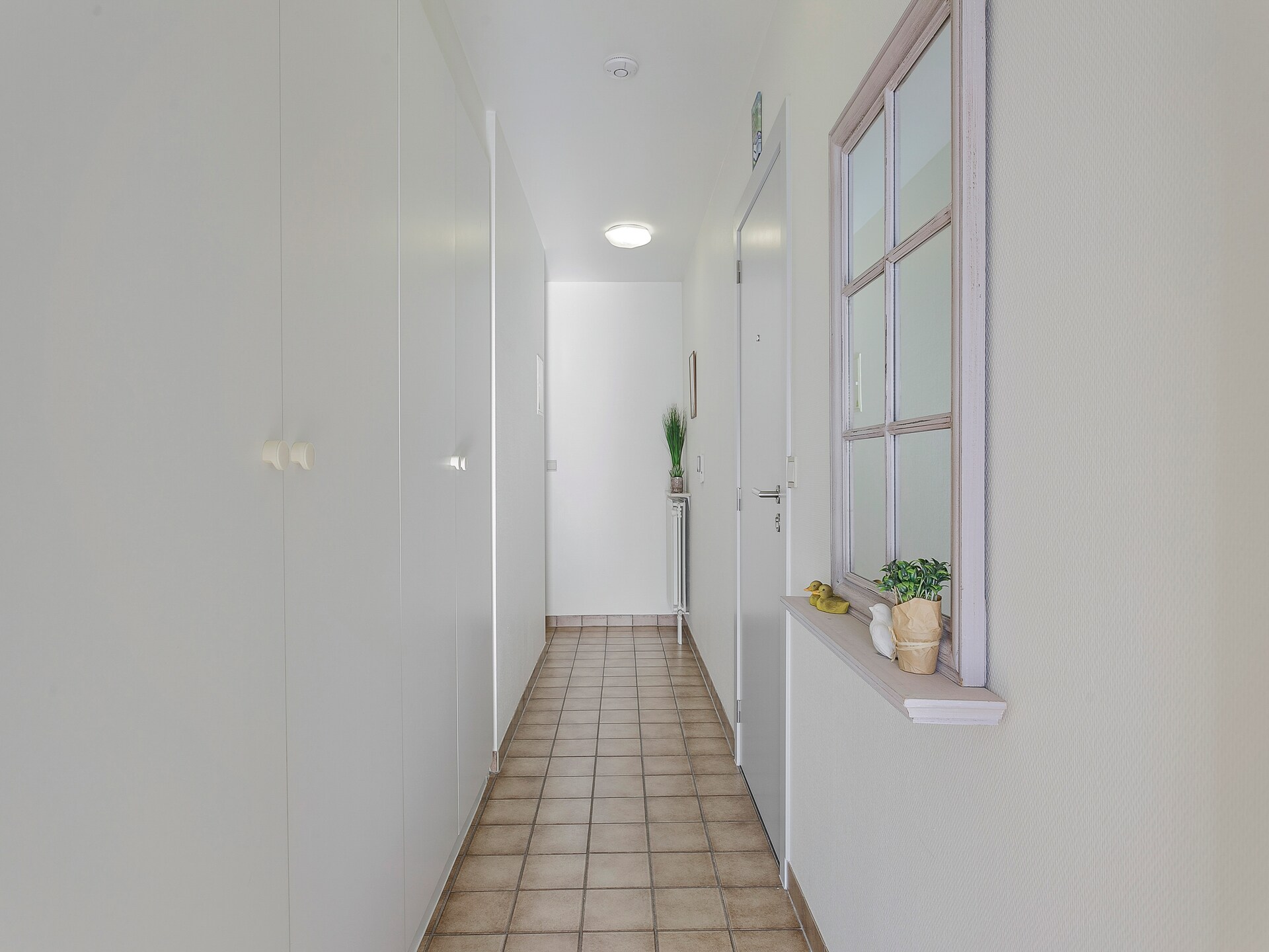 Licht appartement met 2 terrassen op 12 km van zee in Blankenberge - foto 12