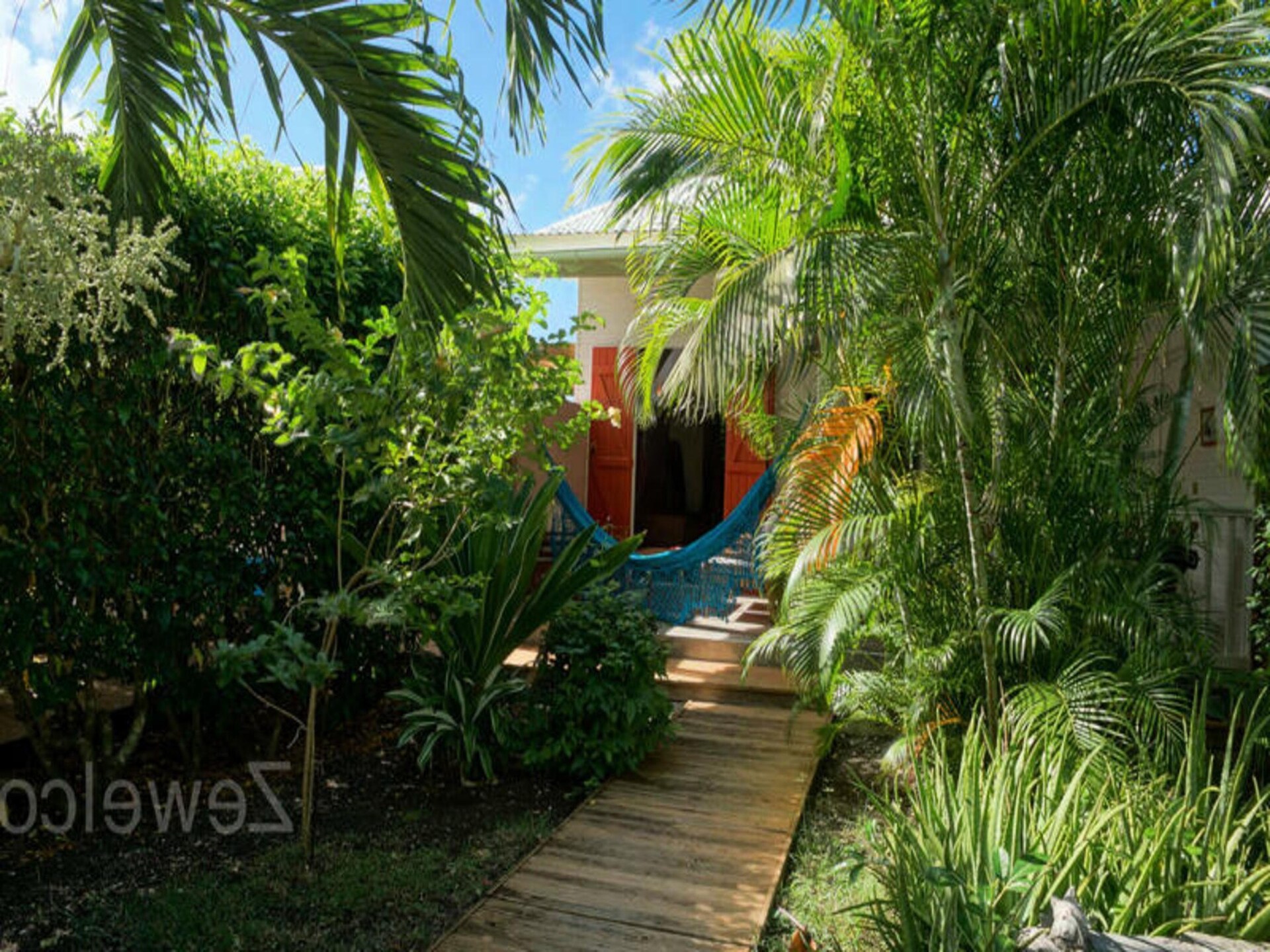 Lichte bungalow met tuin en airco nabij Saint-François - foto 17