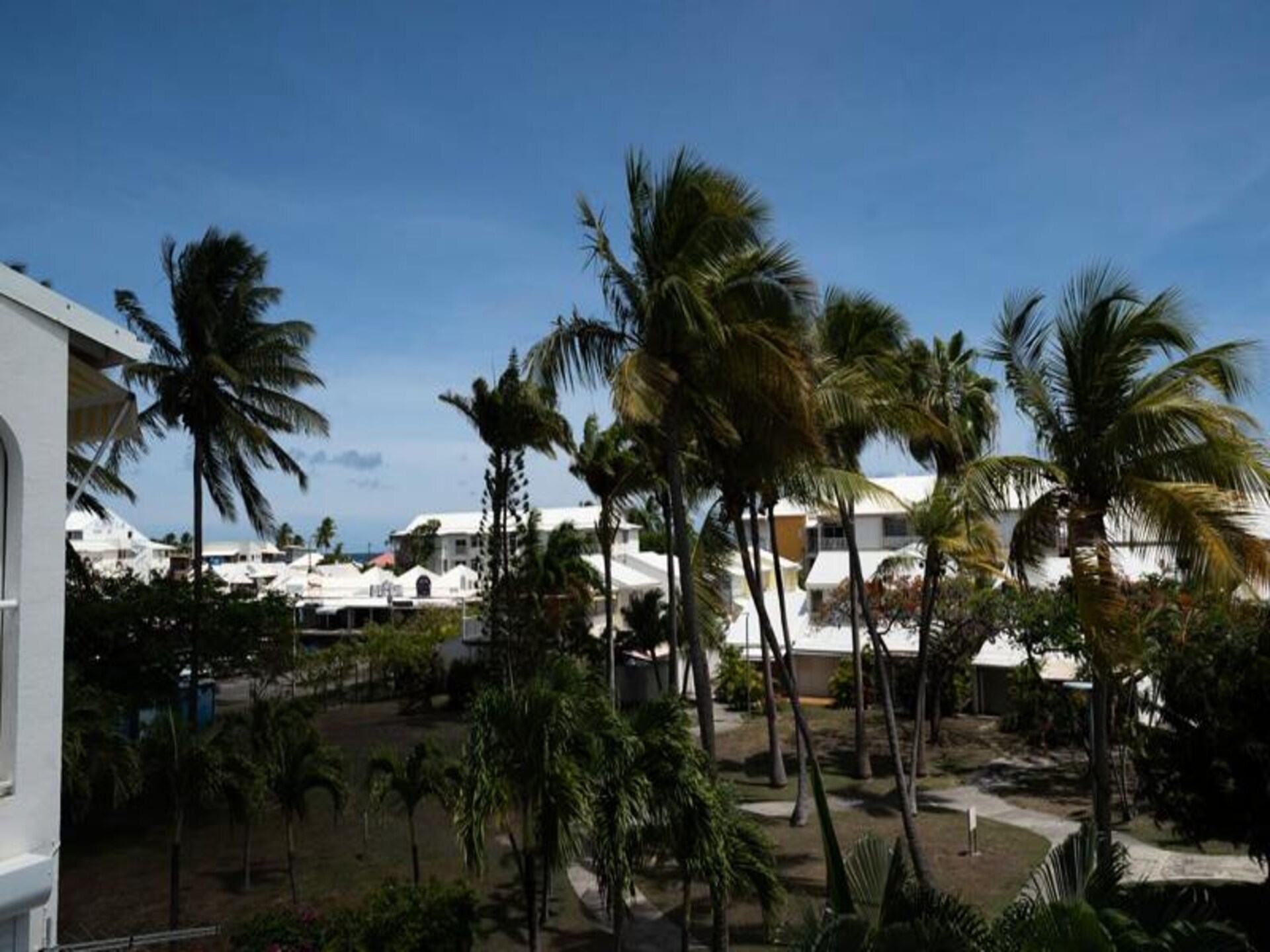 Licht appartement aan jachthaven Saint-François met zwembaden - foto 3