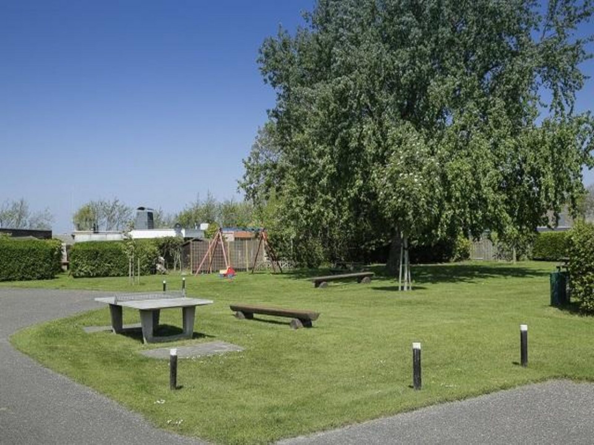 Vrijstaande bungalow De Schelp 14 met zonnige tuin bij Sint Maartenszee - foto 5