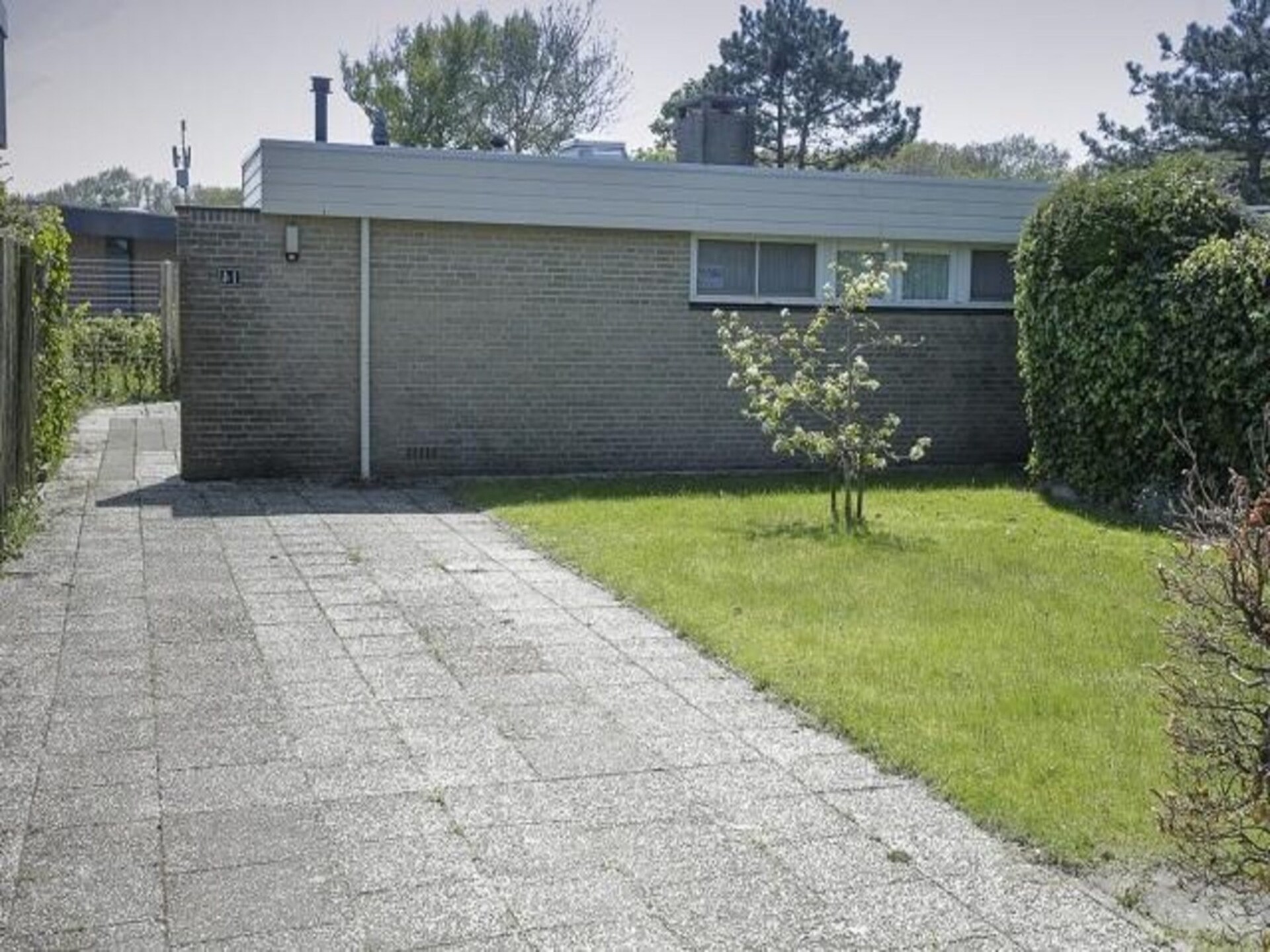 Vrijstaande bungalow De Schelp 14 met zonnige tuin bij Sint Maartenszee - foto 16