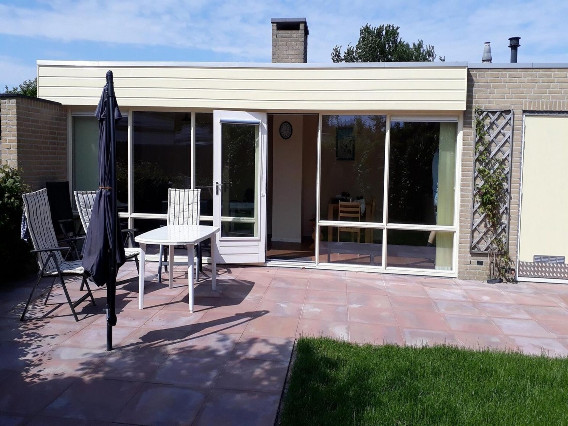 Vrijstaande bungalow De Schelp 14 met zonnige tuin bij Sint Maartenszee - foto 19