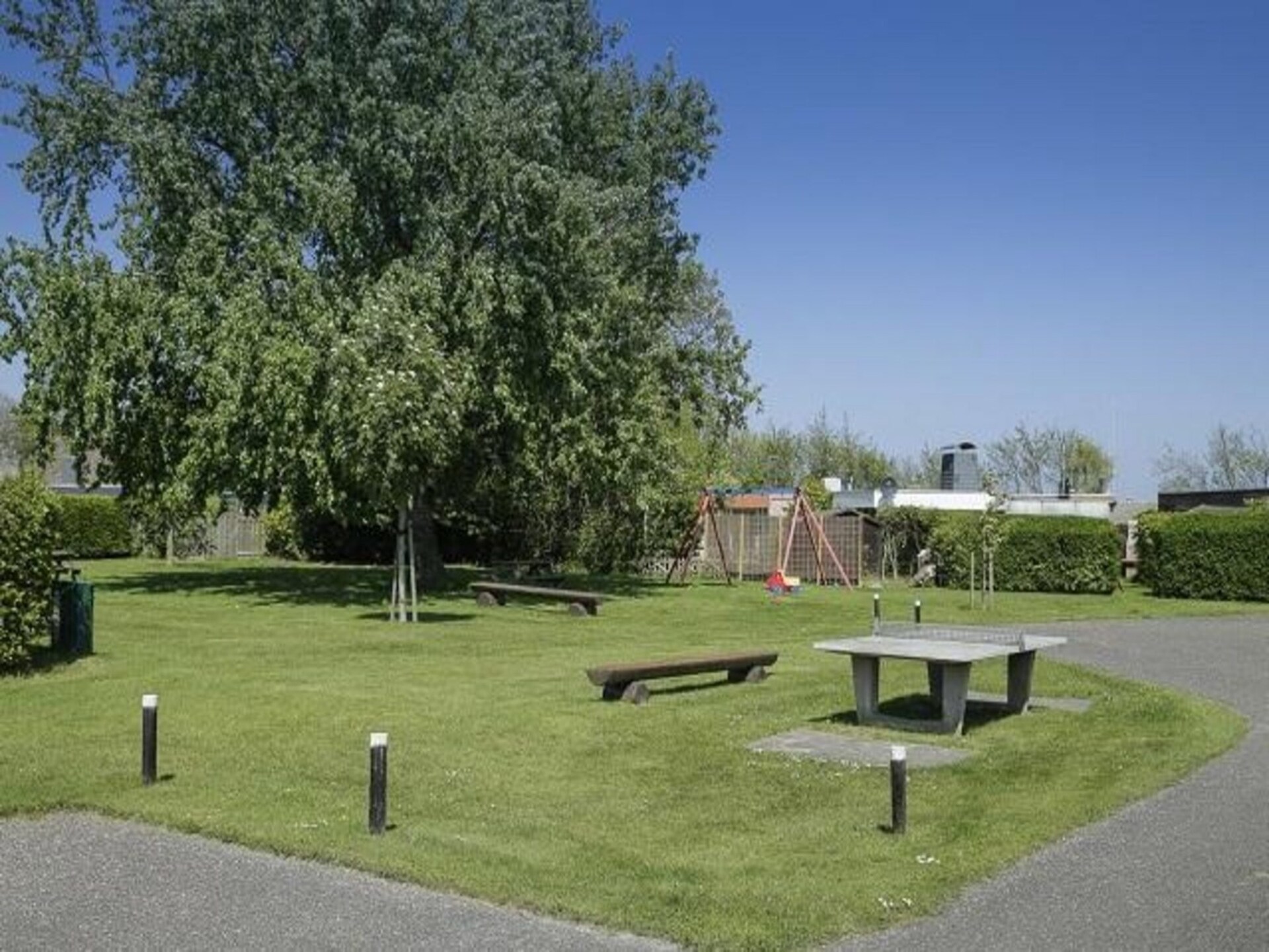 Vrijstaande bungalow De Schelp 14 met zonnige tuin bij Sint Maartenszee - foto 27