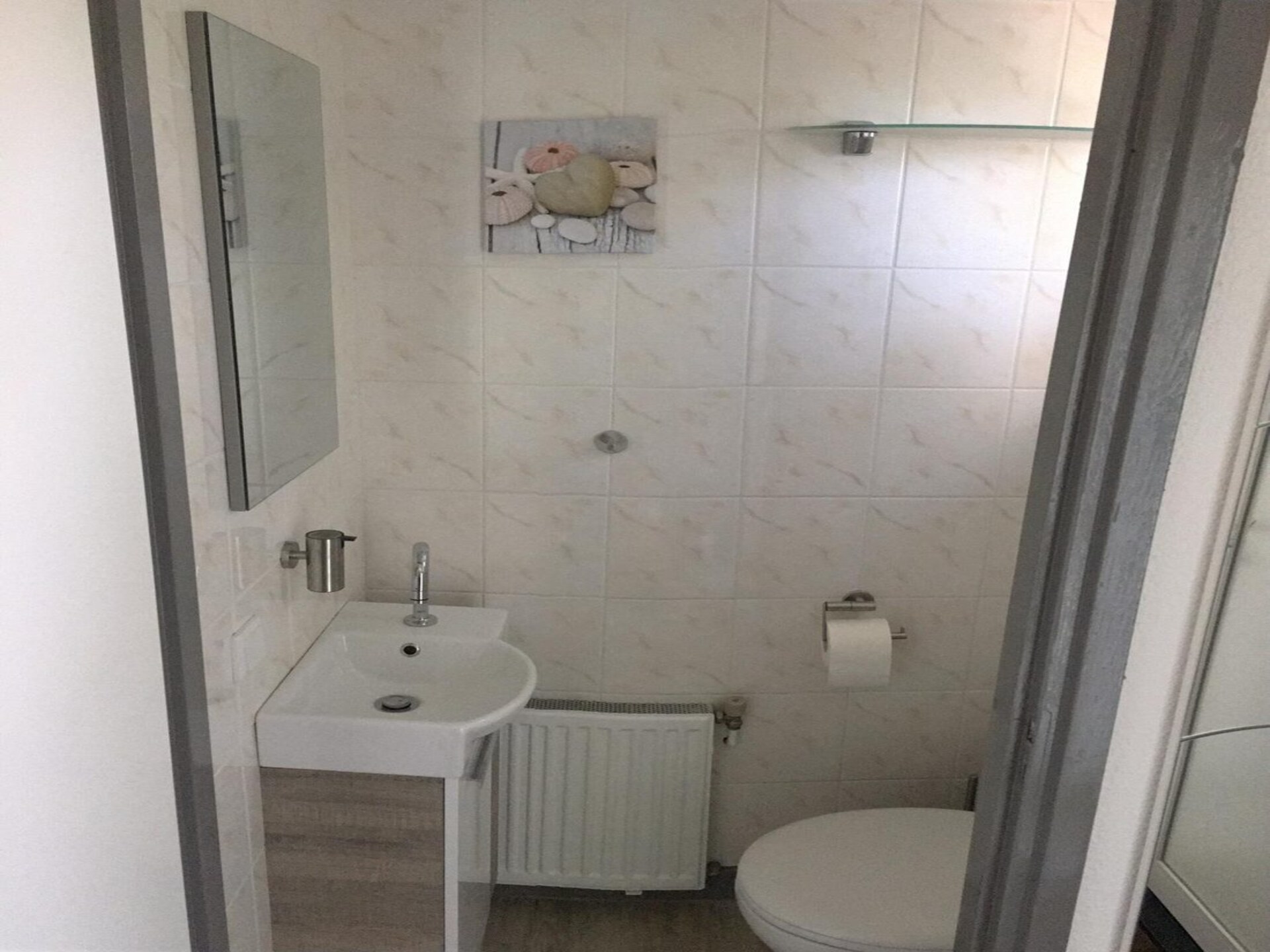 Vrijstaande familiebungalow met overdekt terras in Sint Maartenszee - foto 14