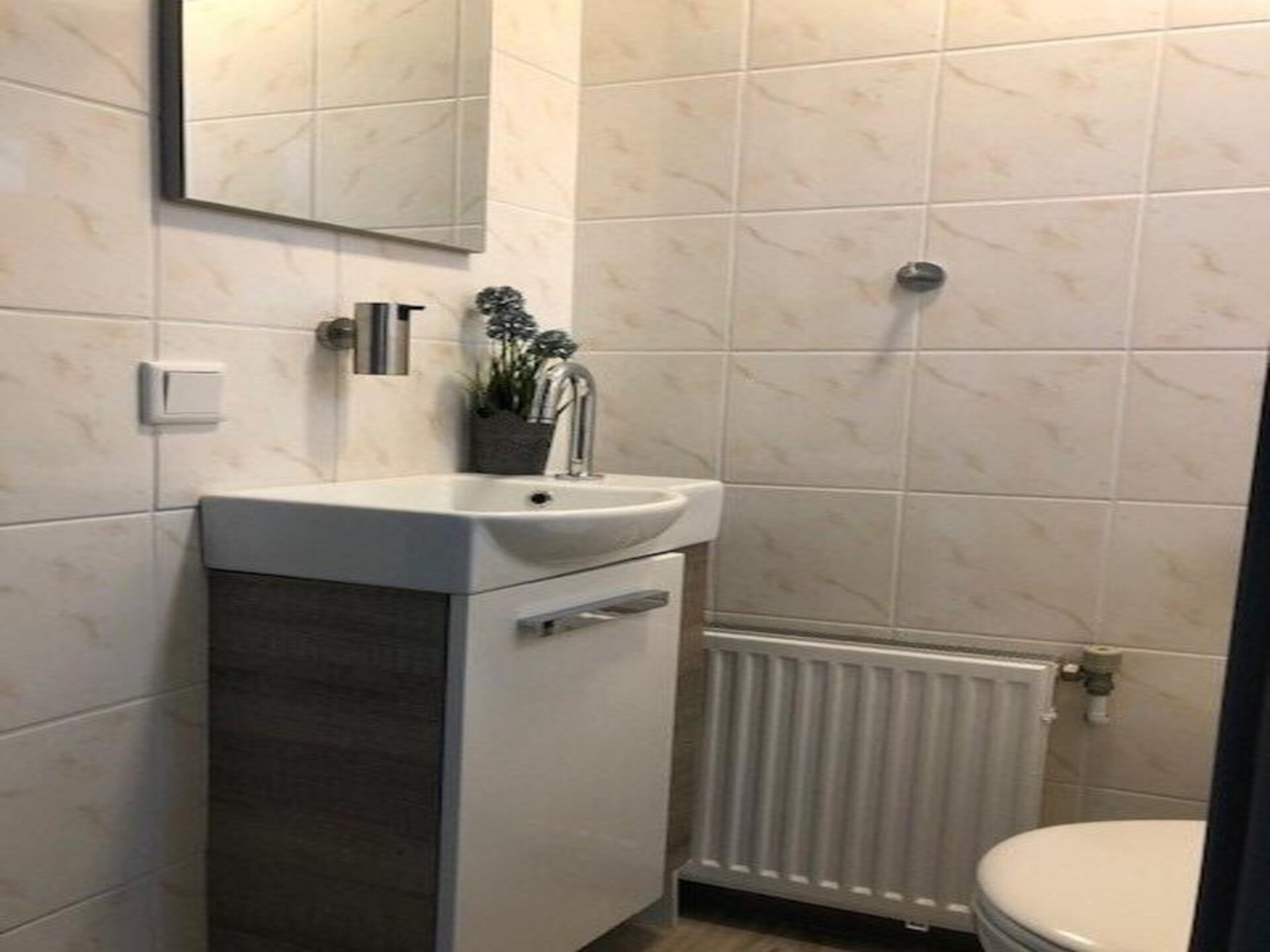 Vrijstaande familiebungalow met overdekt terras in Sint Maartenszee - foto 15