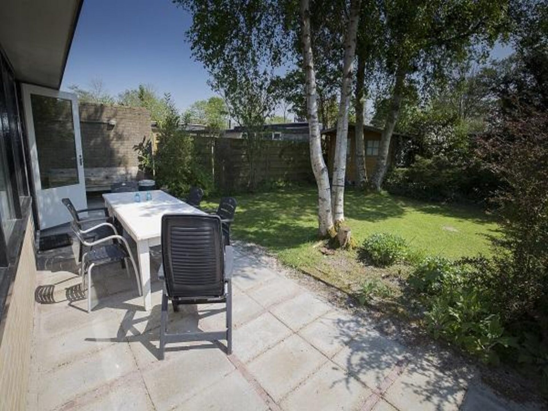 Vrijstaande vakantiebungalow met houtkachel en zonnige tuin in Sint Maartenszee - foto 4
