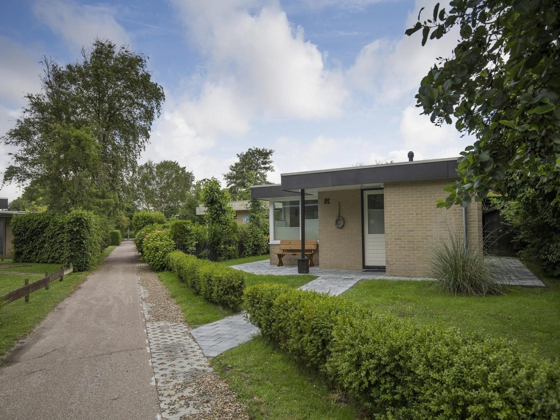 Comfortabele vrijstaande bungalow met zonnige tuin in Sint Maartenszee - foto 32