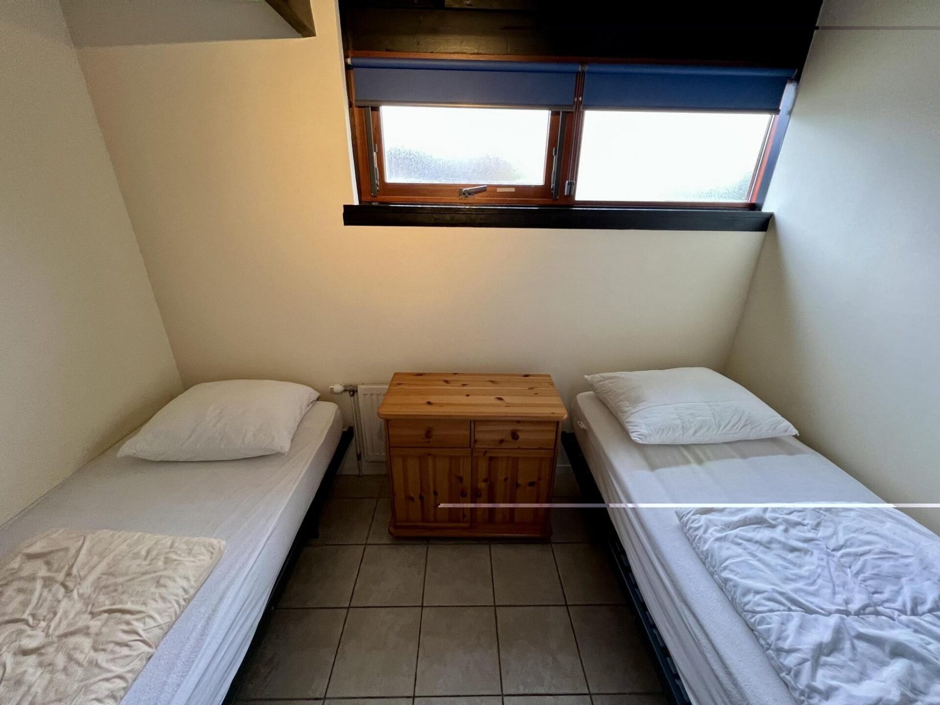 Sfeervolle vrijstaande bungalow met omheinde tuin in Sint Maartenszee - foto 10