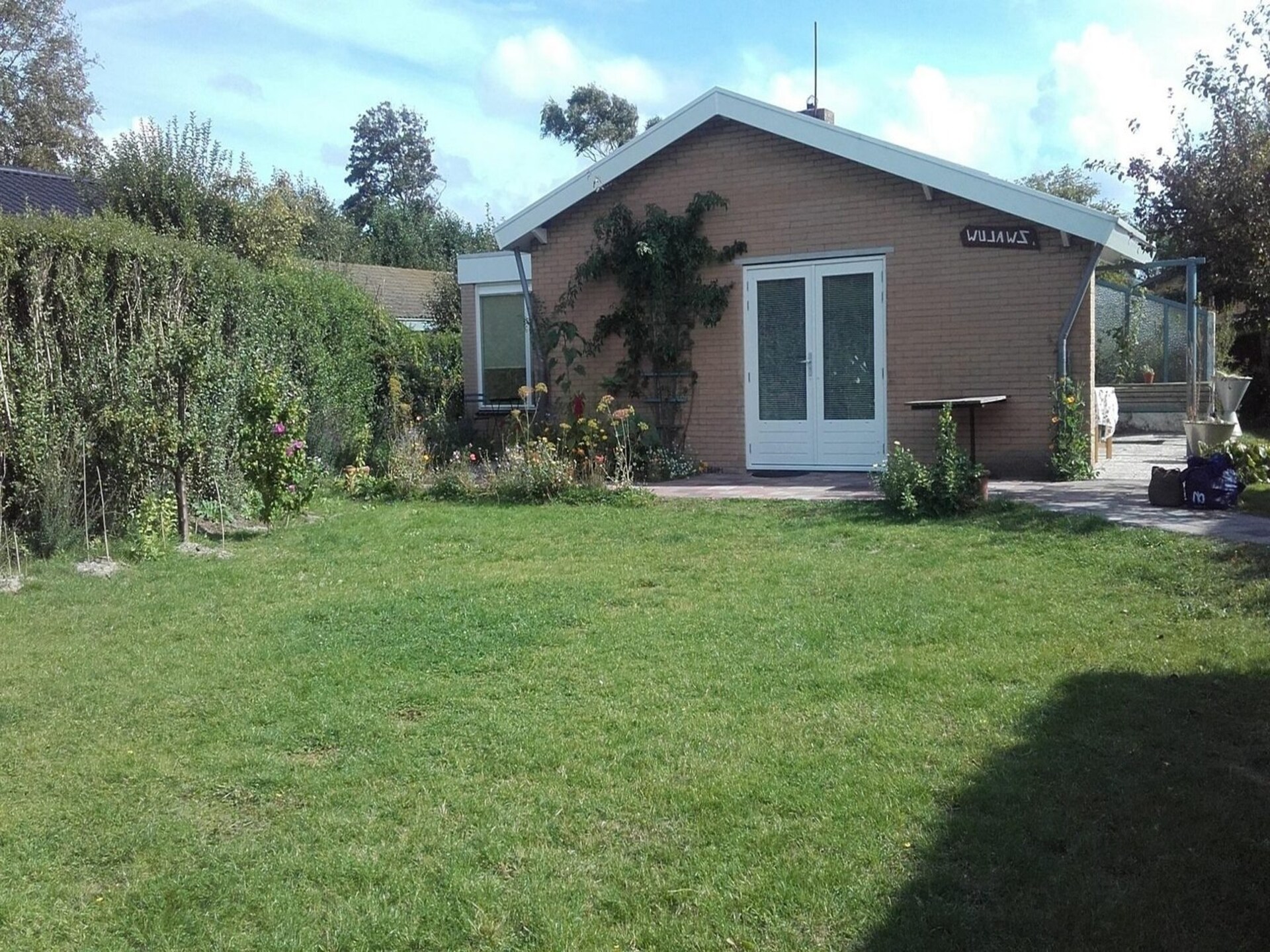 Charmante vrijstaande bungalow in Sint Maartenszee, 500m van strand - foto 38