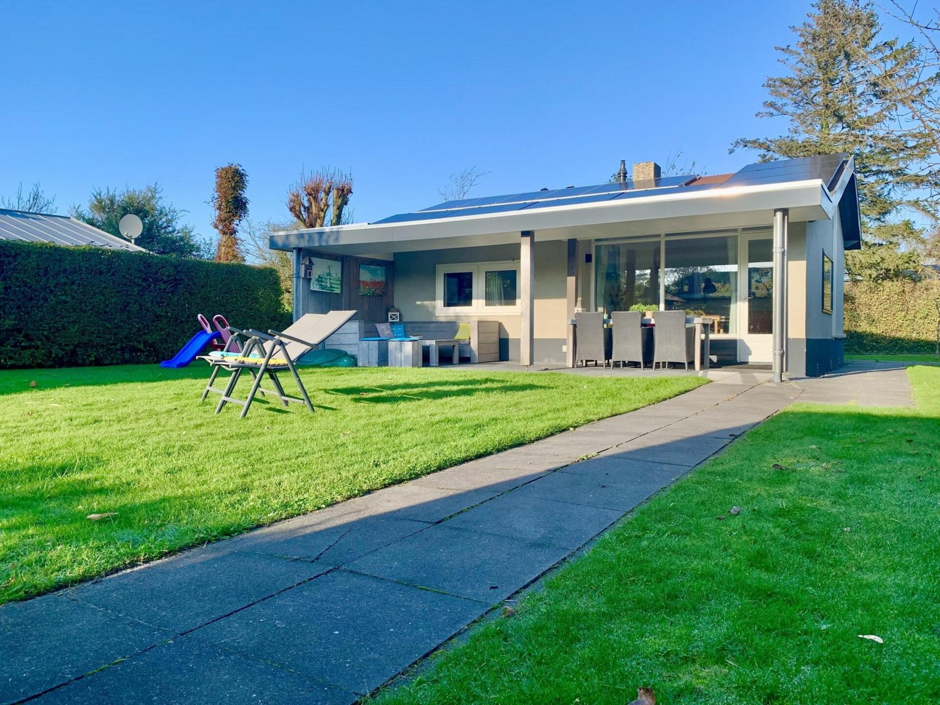 Vrijstaande vakantiebungalow met veranda en omheinde tuin in Sint Maartenszee - foto 7