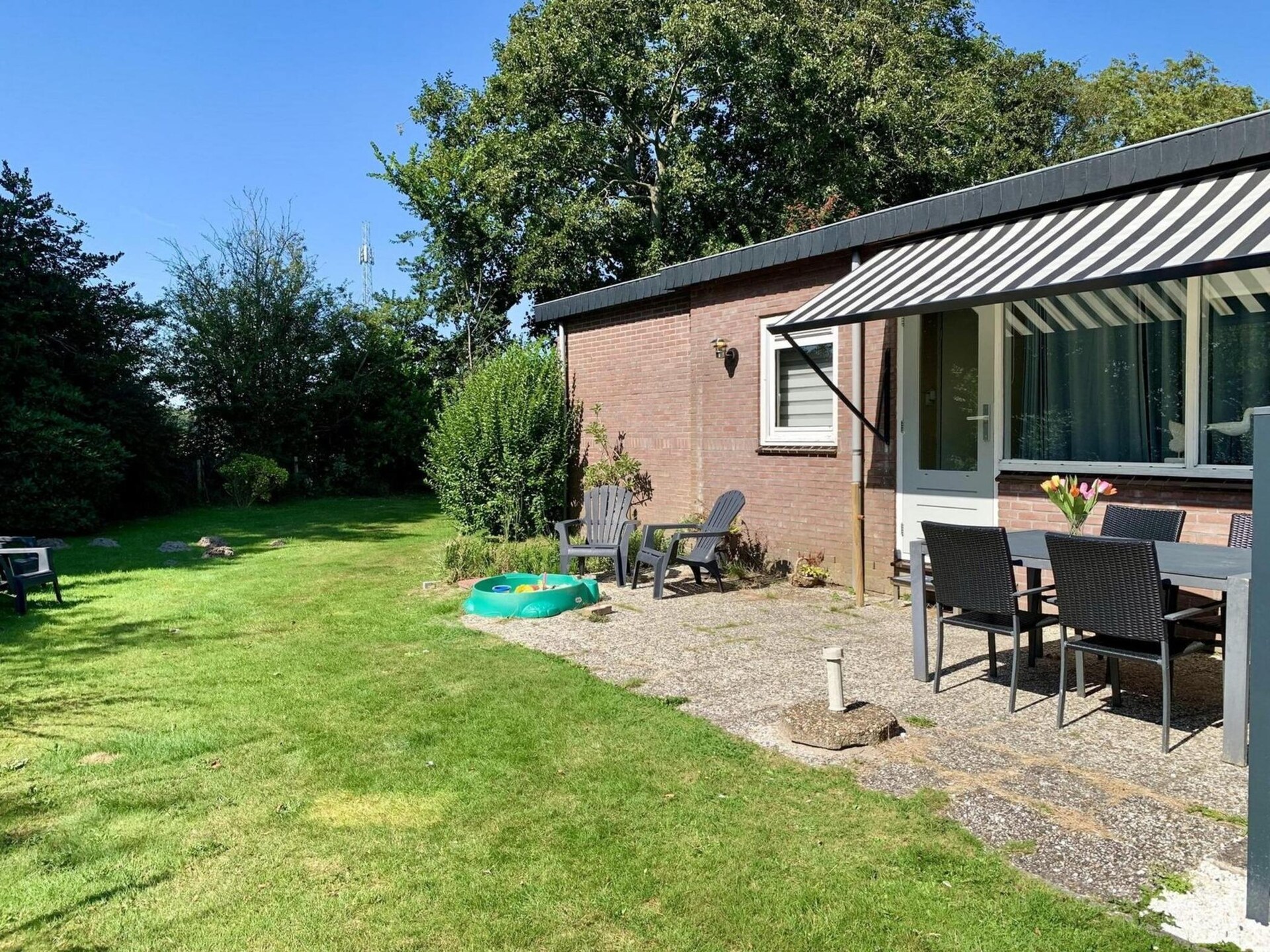 Vrijstaande 5-persoonsbungalow met grote tuin nabij strand Sint Maartenszee - foto 25