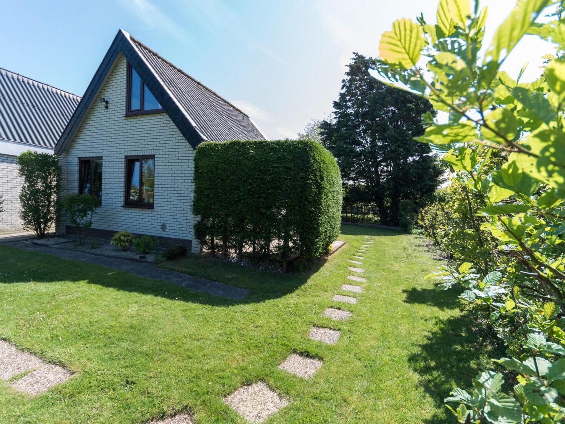 Vrijstaande bungalow aan zee voor 5 personen met grote tuin in Sint Maartenszee - foto 7
