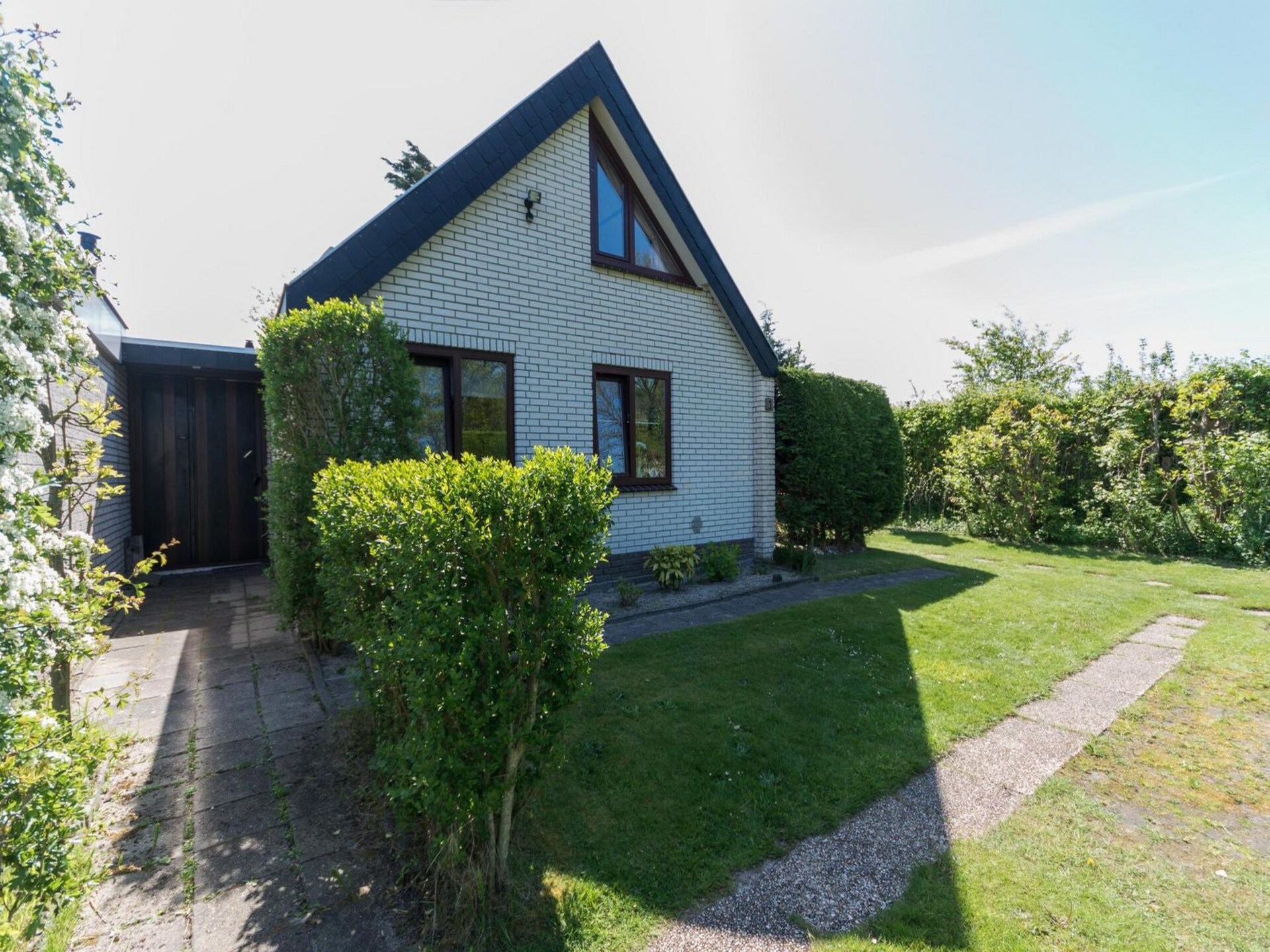 Vrijstaande bungalow aan zee voor 5 personen met grote tuin in Sint Maartenszee - foto 8