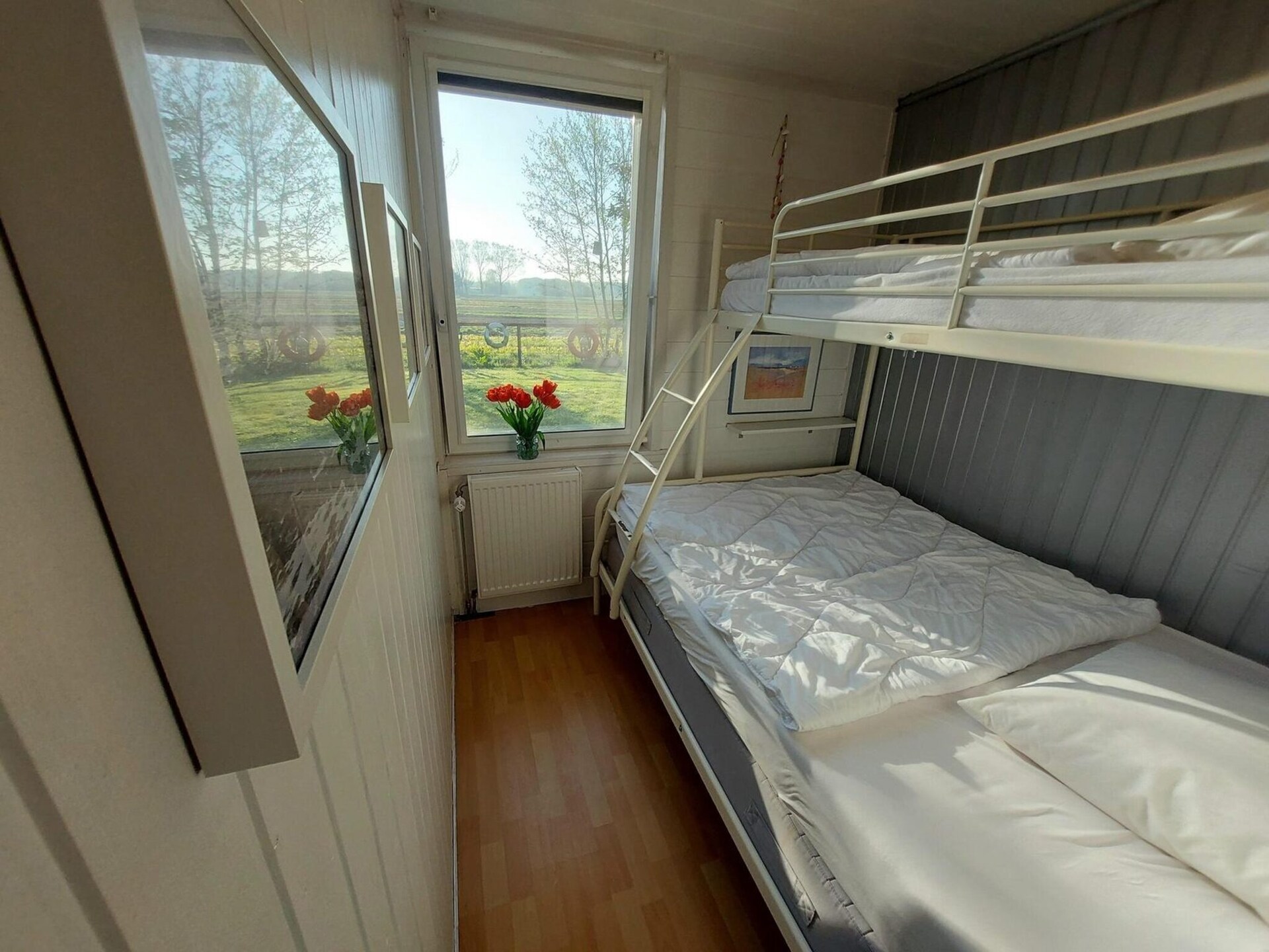 Vrijstaande bungalow met grote tuin op 1,5 km van strand Sint Maartenszee - foto 10