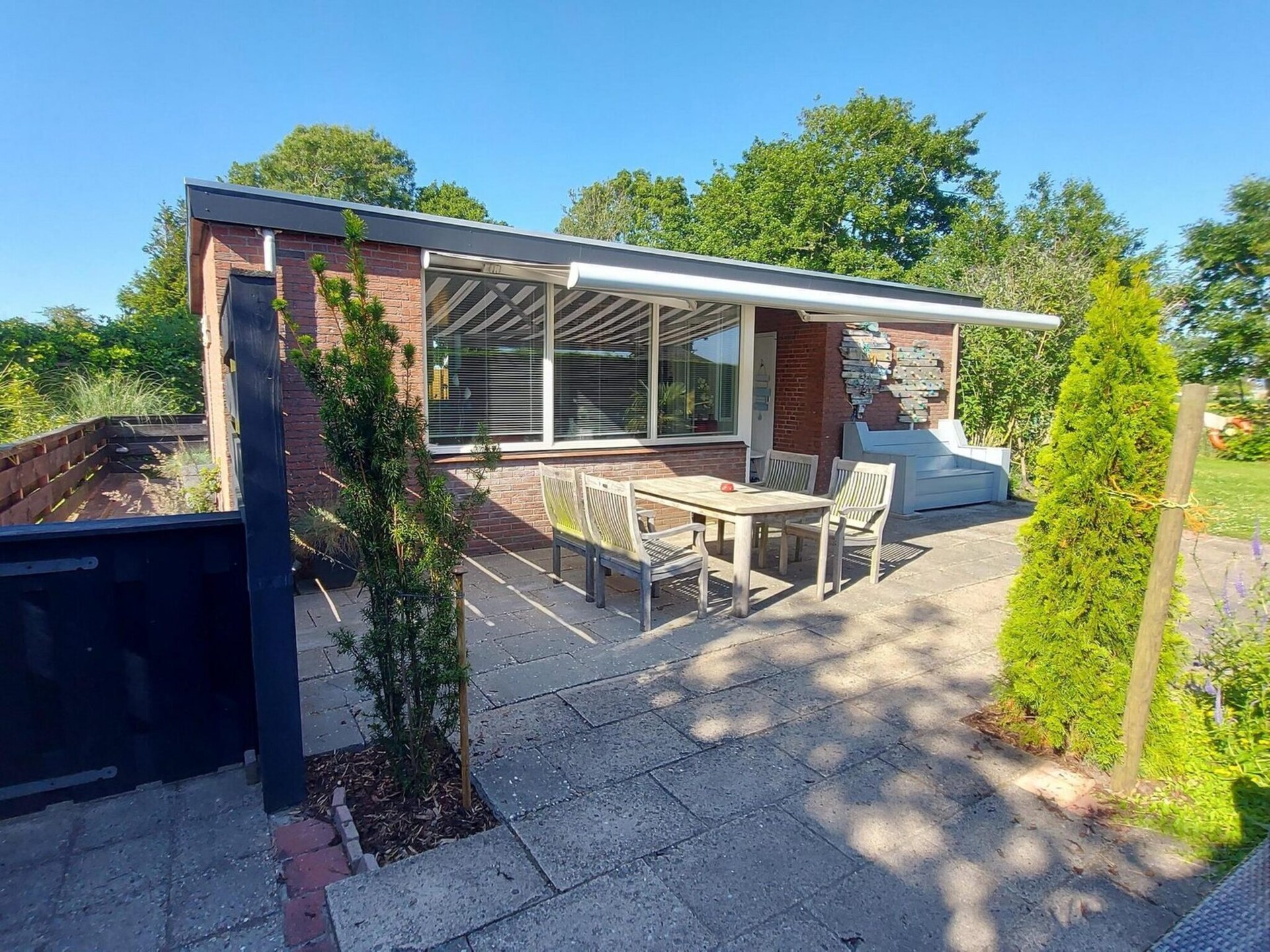 Vrijstaande bungalow met grote tuin op 1,5 km van strand Sint Maartenszee - foto 20