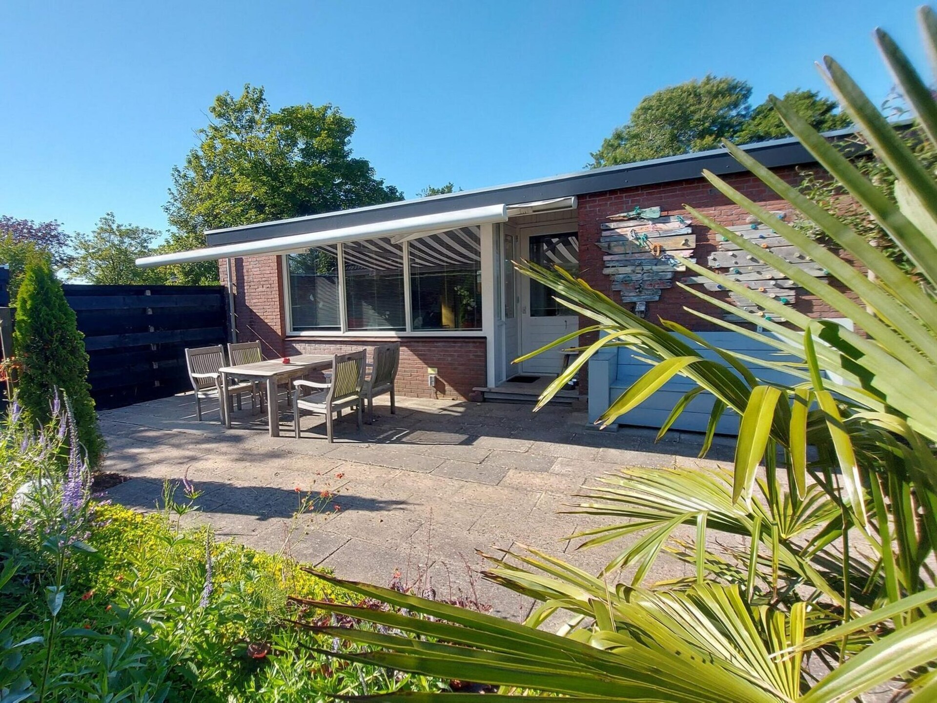 Vrijstaande bungalow met grote tuin op 1,5 km van strand Sint Maartenszee - foto 13