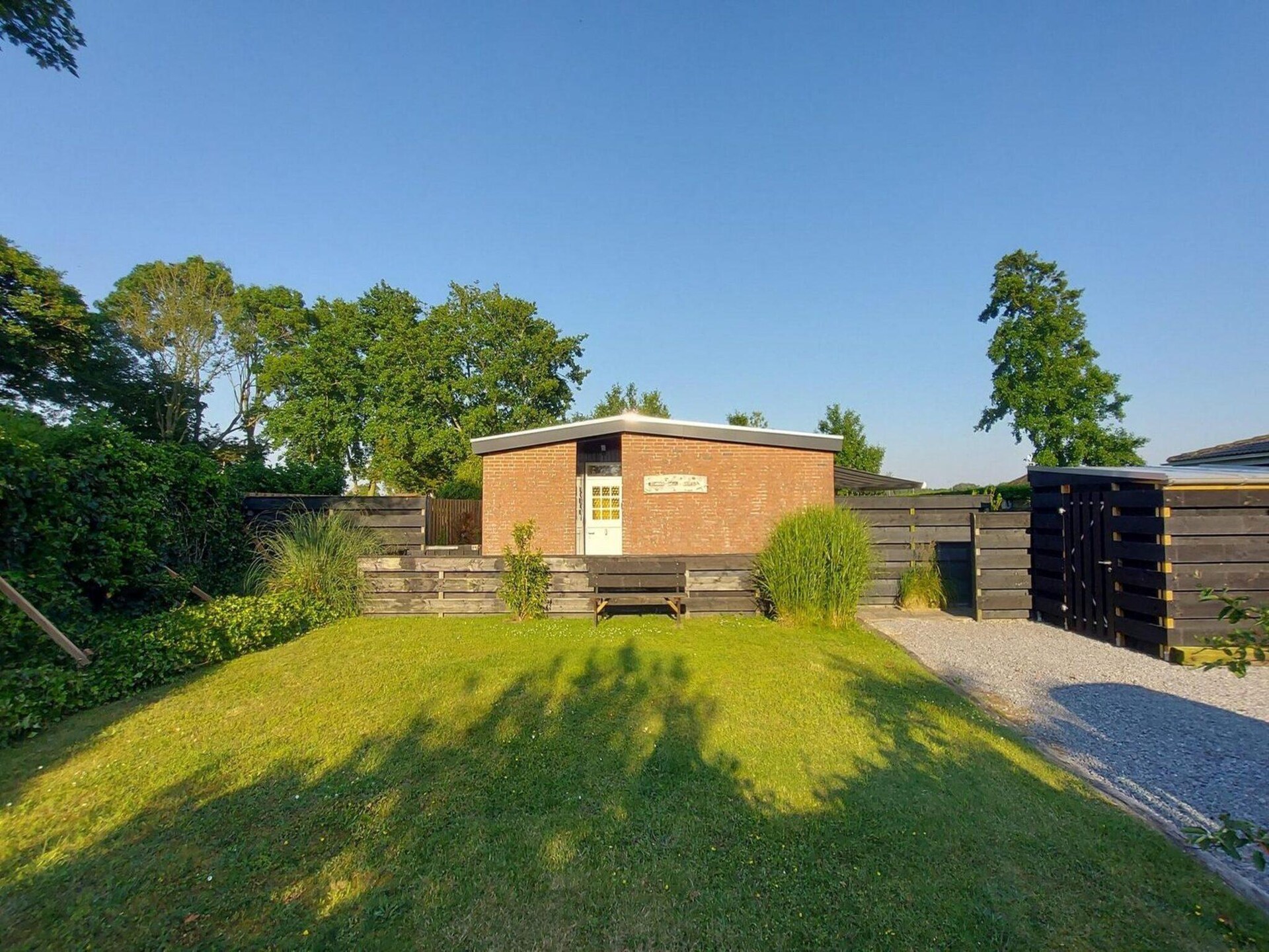 Vrijstaande bungalow met grote tuin op 1,5 km van strand Sint Maartenszee - foto 7