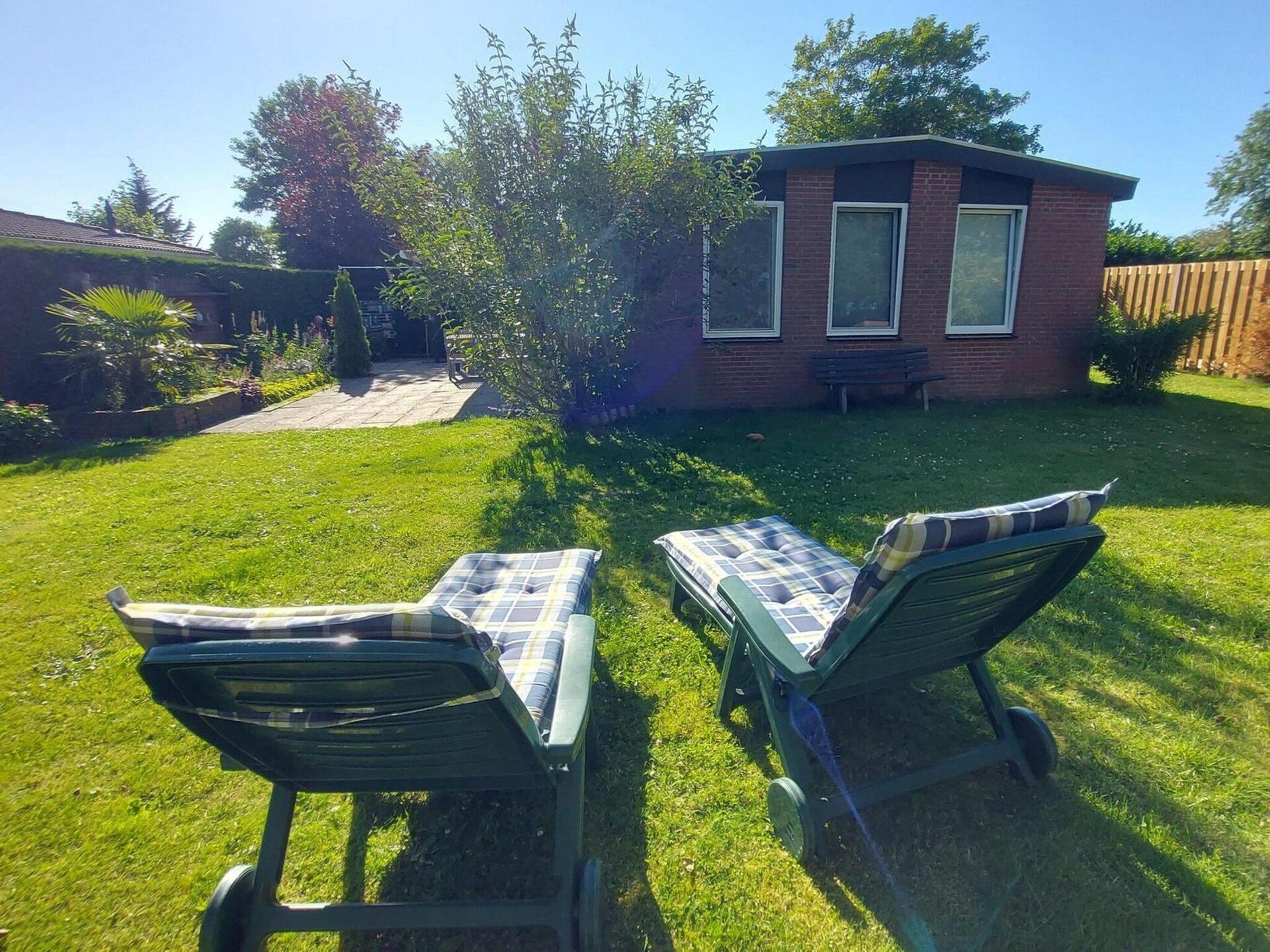 Vrijstaande bungalow met grote tuin op 1,5 km van strand Sint Maartenszee - foto 15
