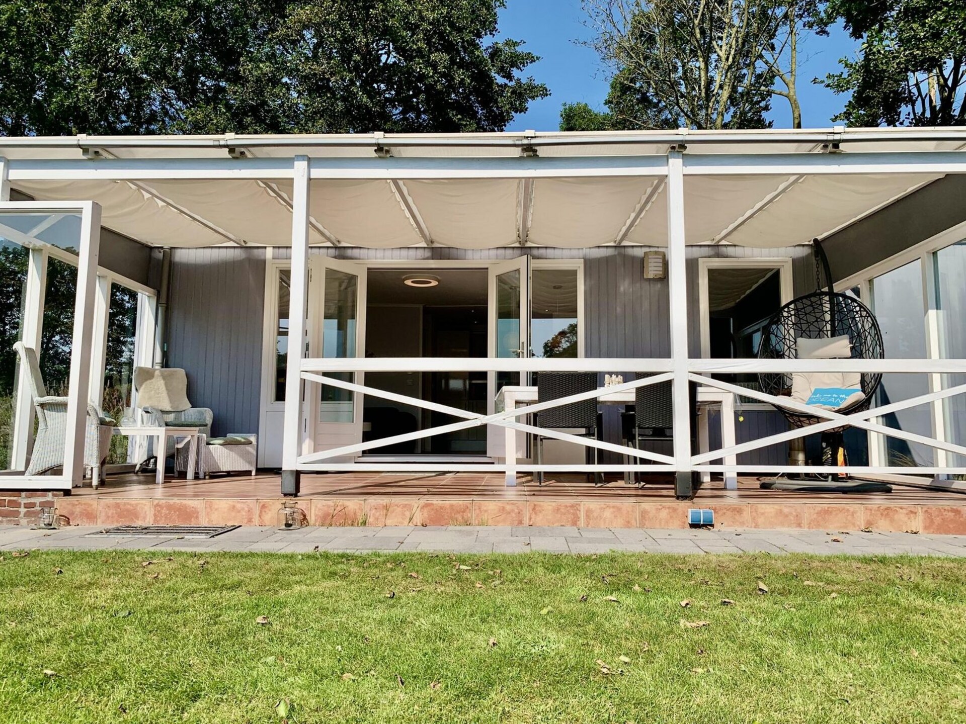 Moderne bungalow met omheinde tuin op 1,5 km van het strand van Sint-Maartenszee - foto 12