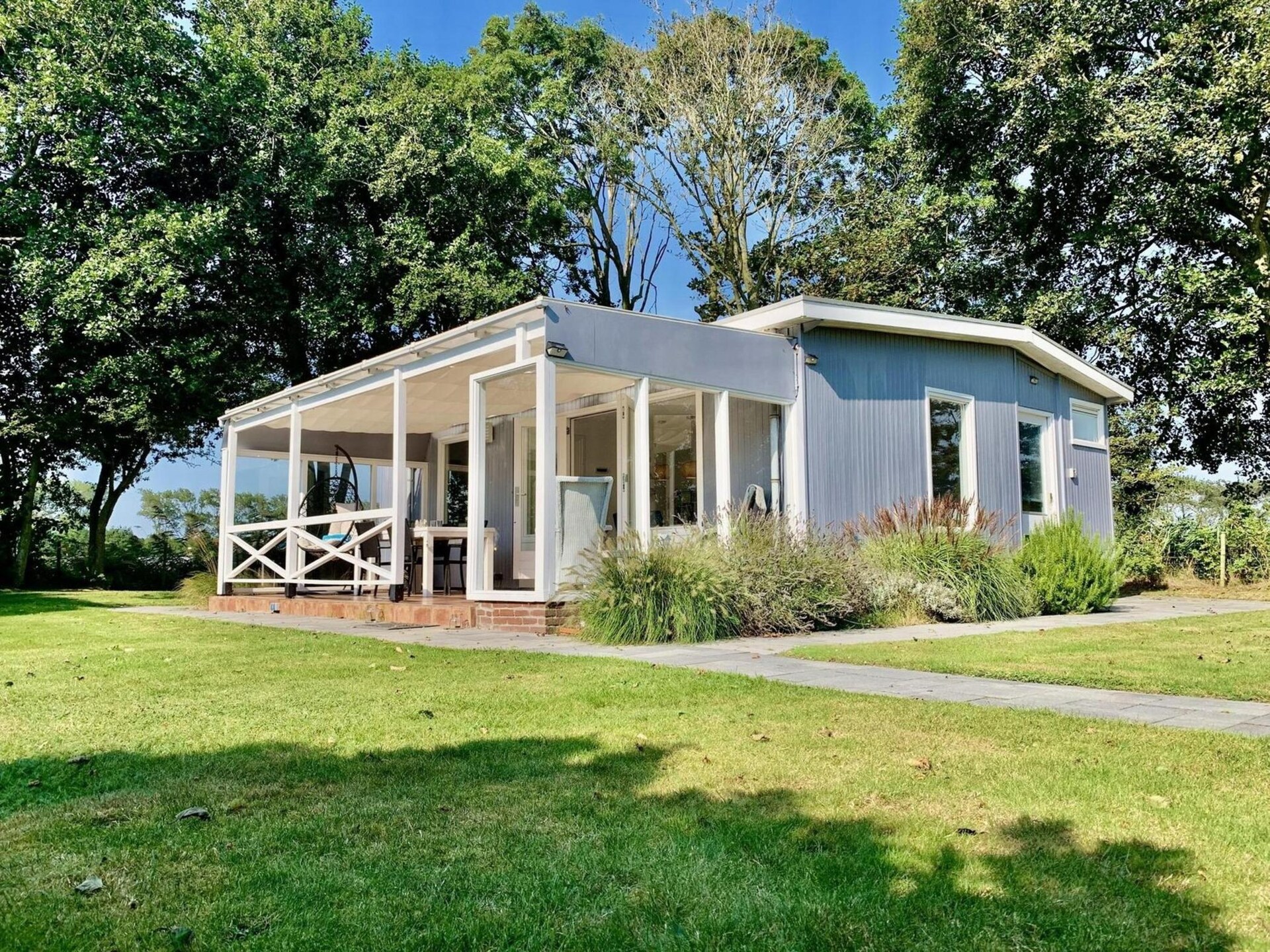 Moderne bungalow met omheinde tuin op 1,5 km van het strand van Sint-Maartenszee - foto 20