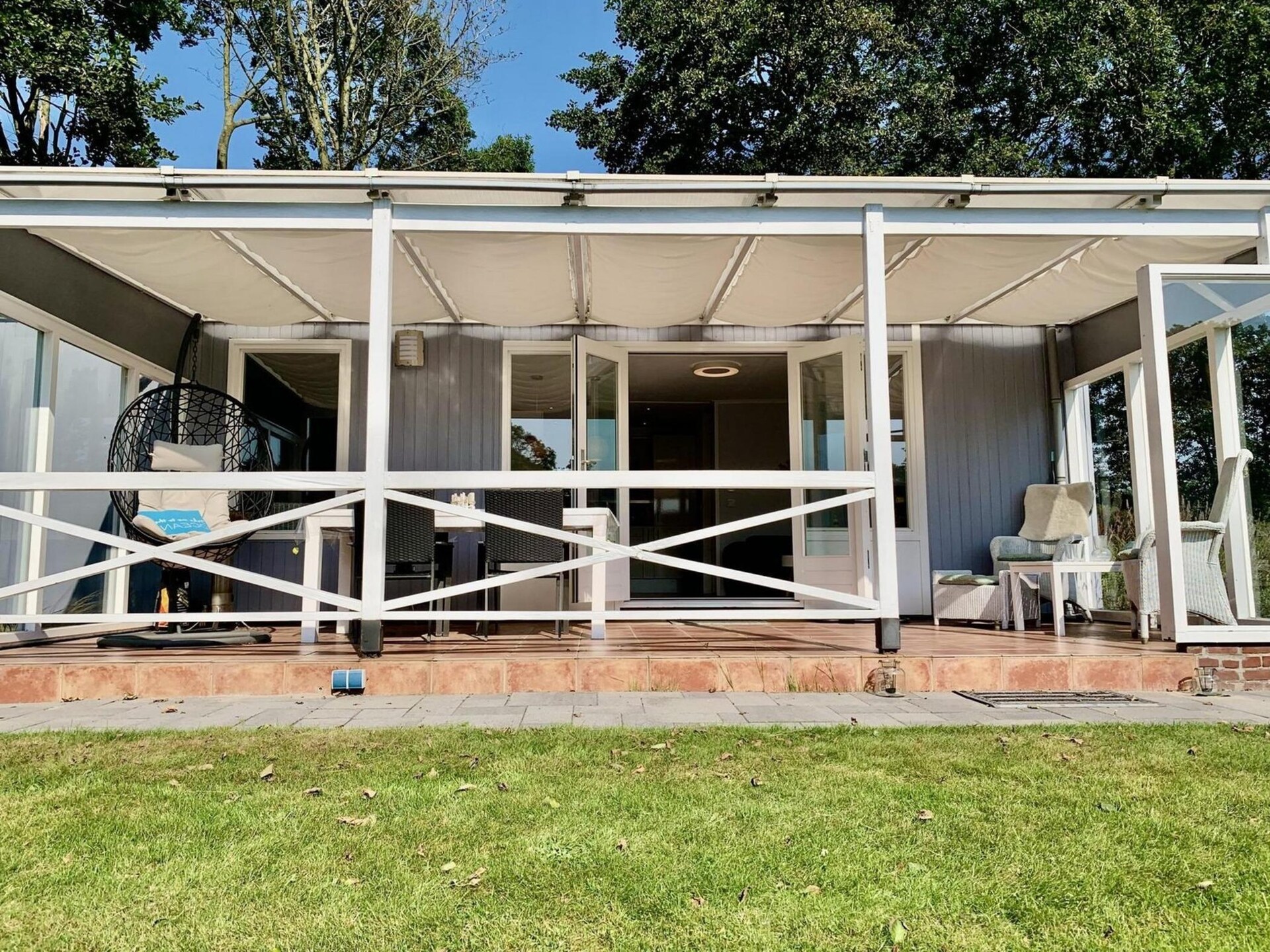 Moderne bungalow met omheinde tuin op 1,5 km van het strand van Sint-Maartenszee - foto 30