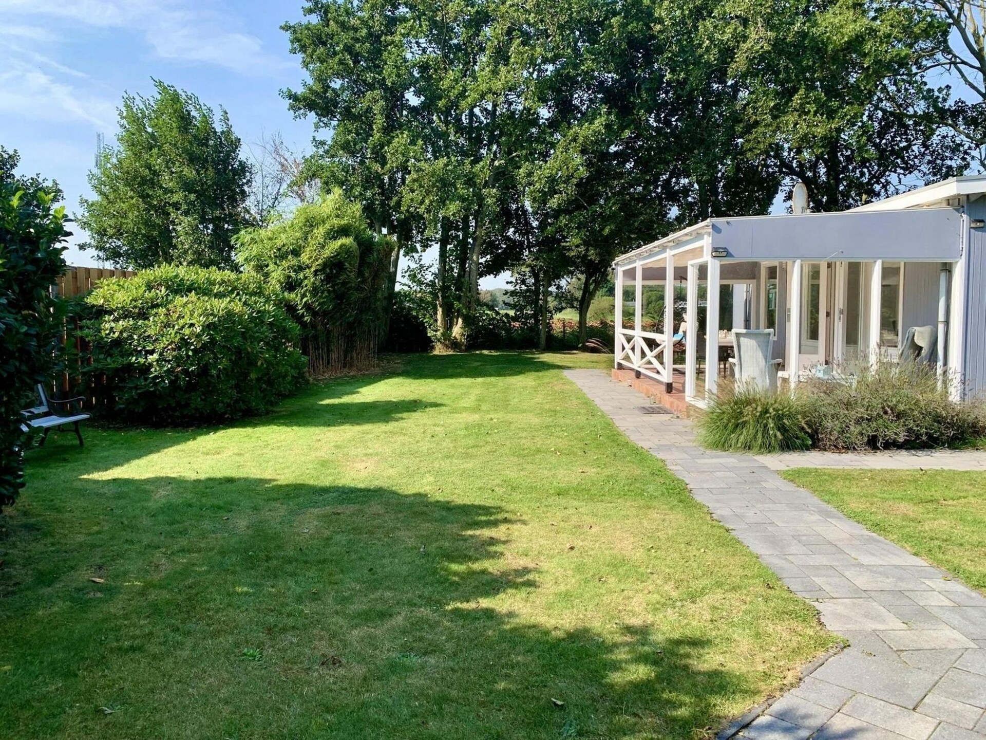 Moderne bungalow met omheinde tuin op 1,5 km van het strand van Sint-Maartenszee - foto 31