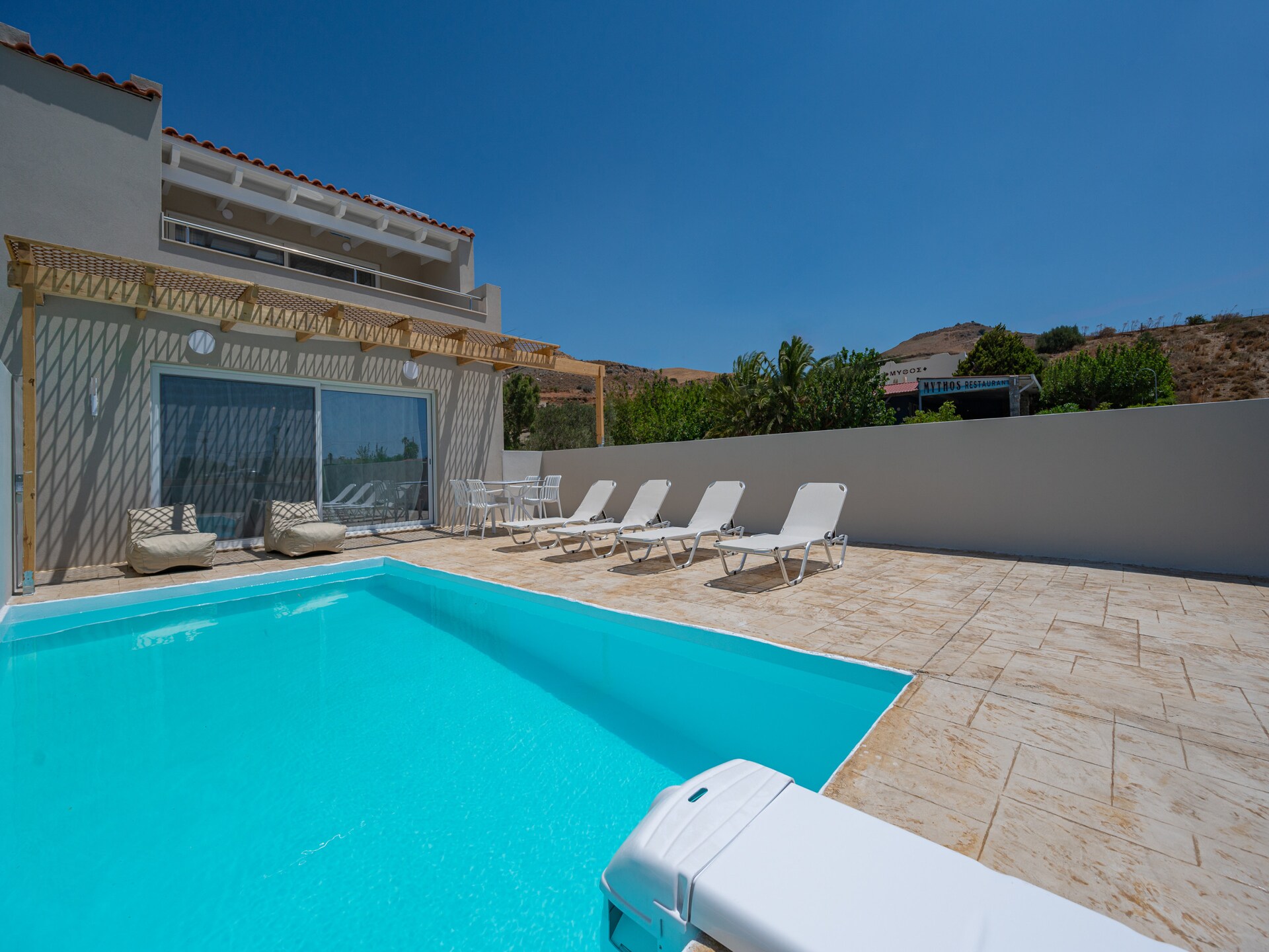 Aan het strand: Luxe villa met privézwembad in Damnoni · 4 pers. - foto 7