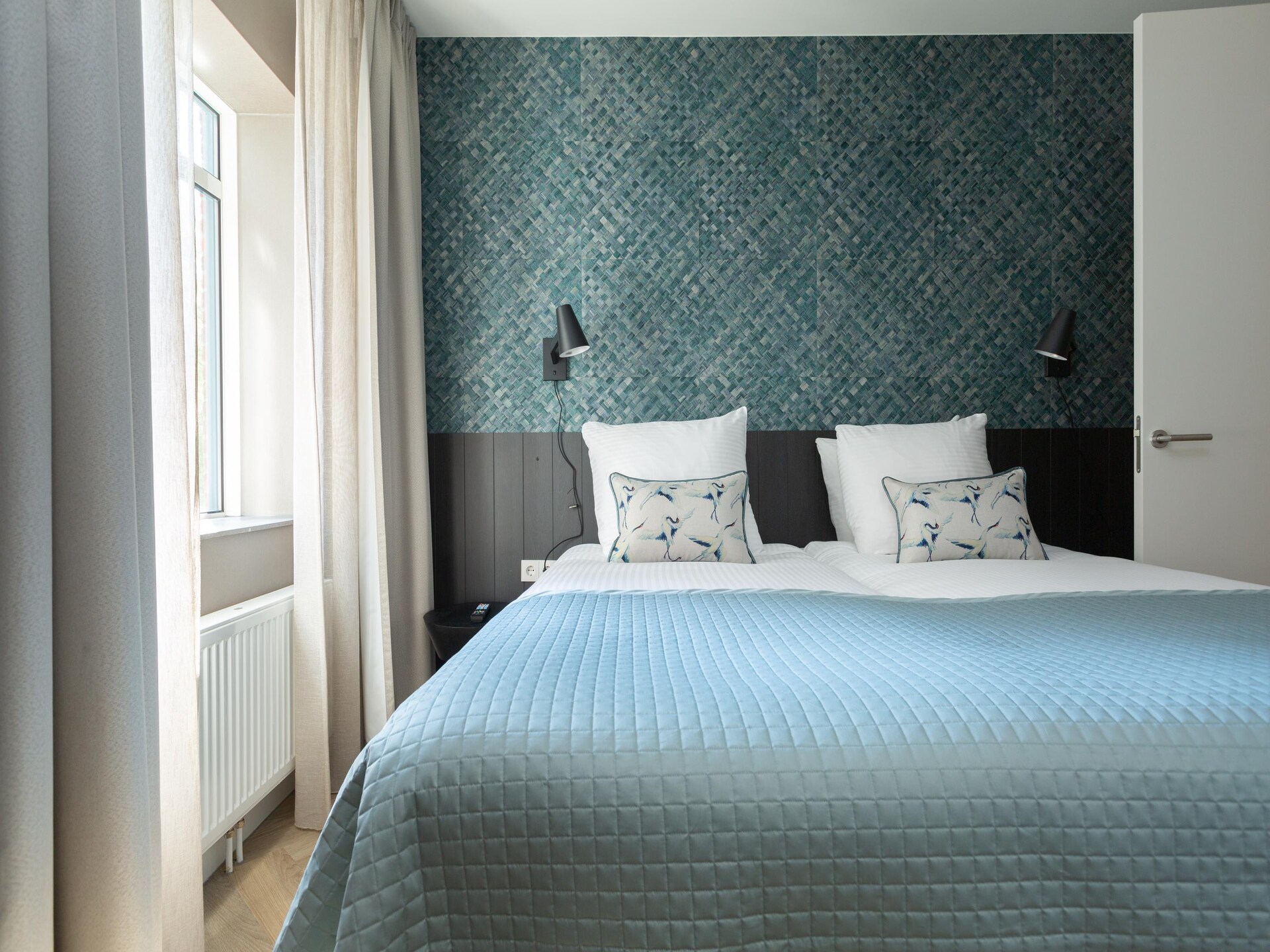 Stijlvol appartement met grachtenuitzicht in levendige Haagse wijk - foto 11