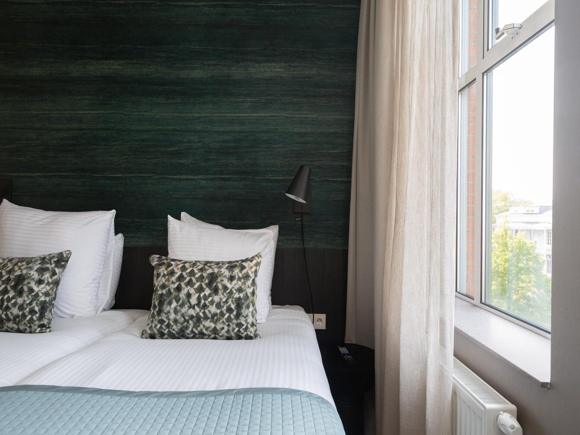 Stijlvol appartement met grachtenuitzicht in levendige Haagse wijk - foto 28