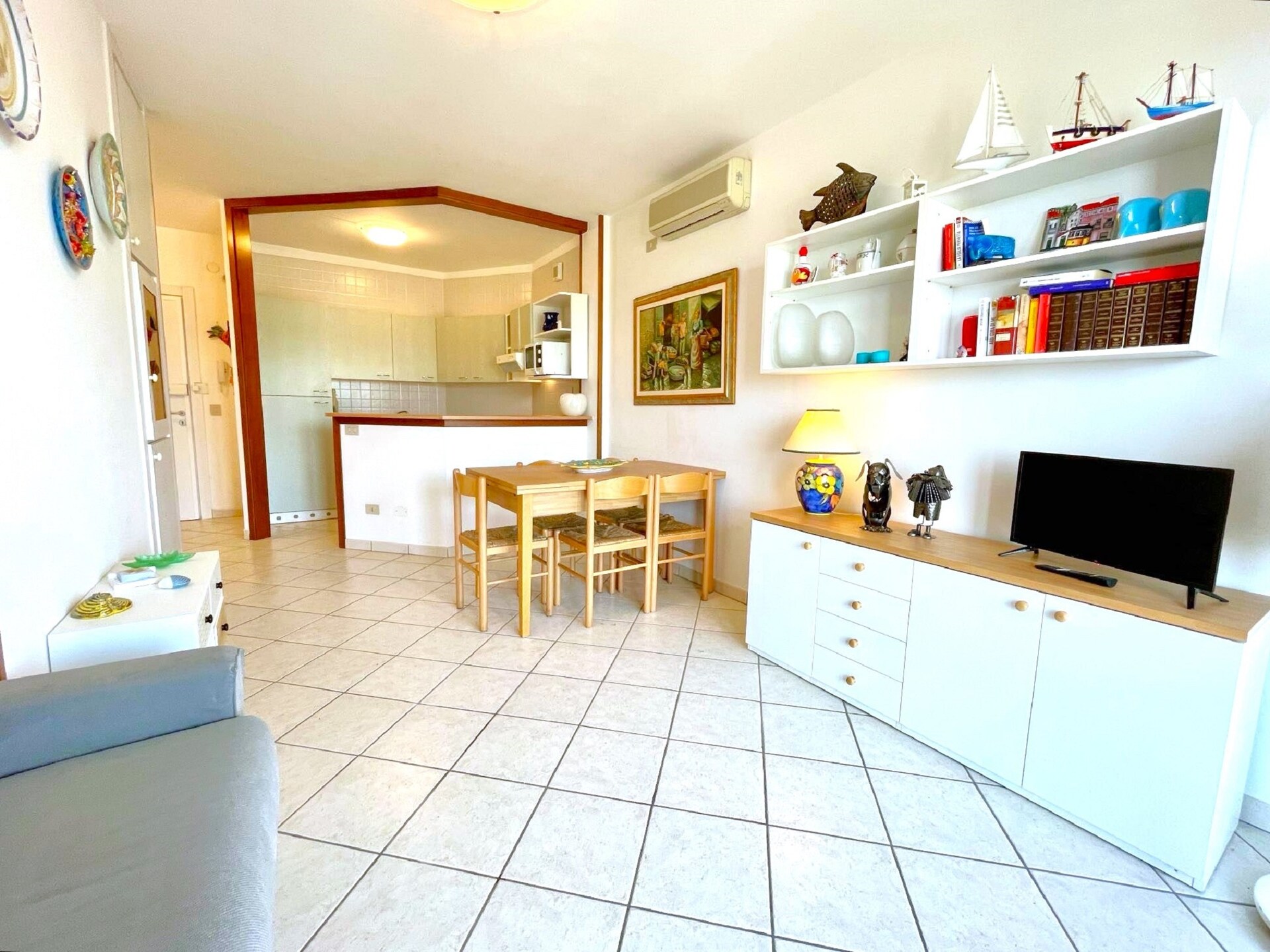 Zonovergoten appartement met zwembad op 50 meter van zee in Porto Santa Margherita - foto 21