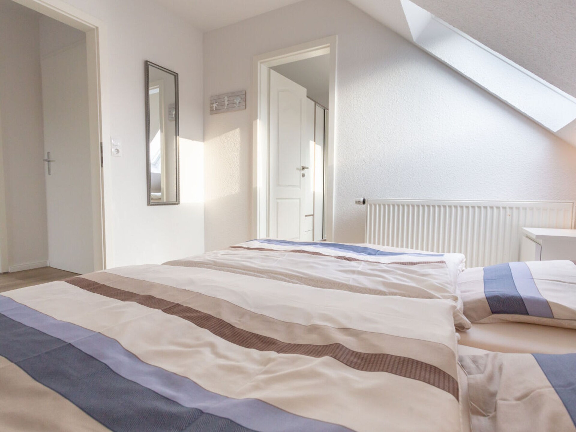 Zonovergoten appartement in Norddeich met overdekt terras en parkeerplaats - foto 11