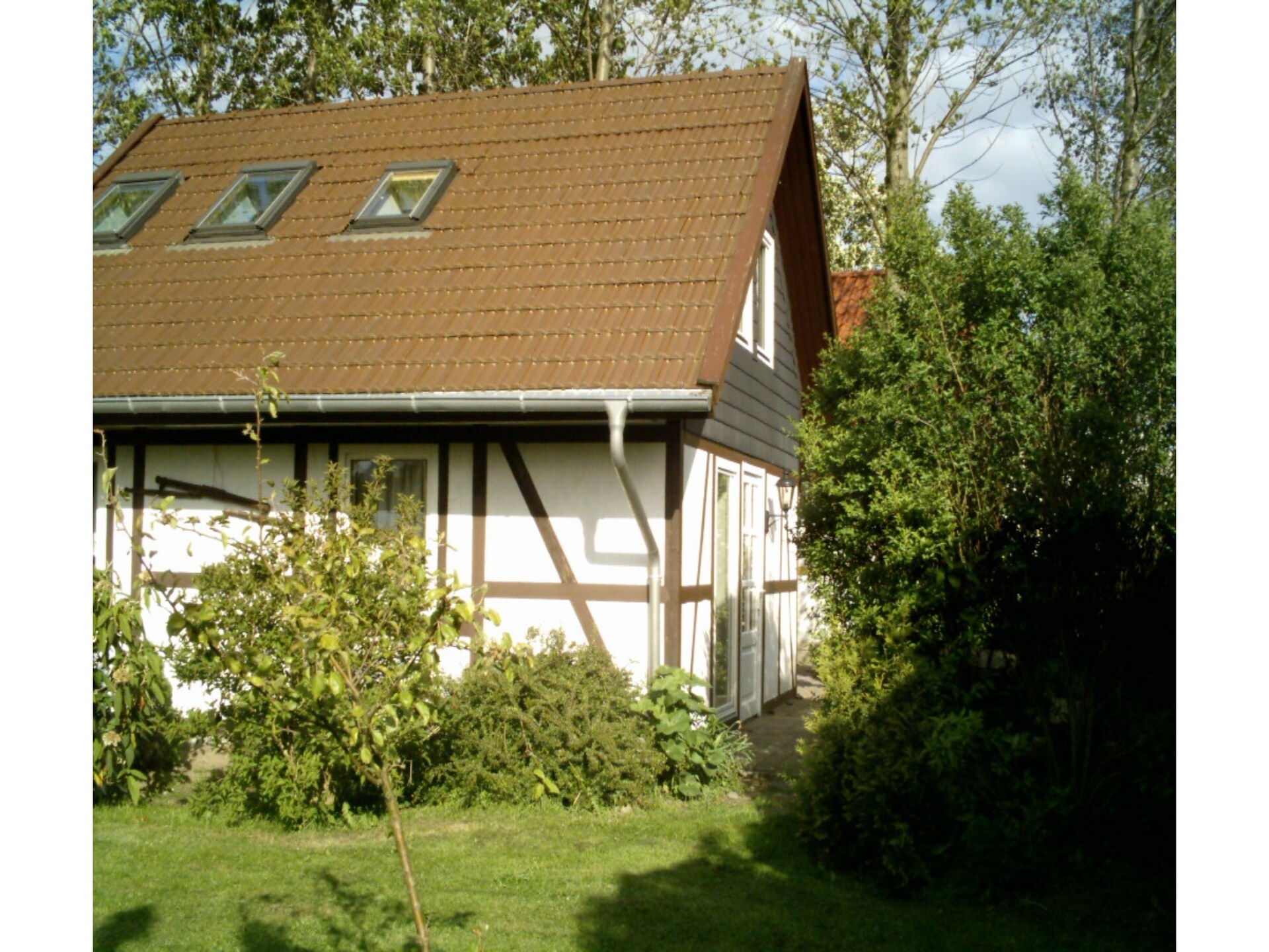 Vrijstaande bungalow aan de golfbaan bij de Oostzee - foto 2