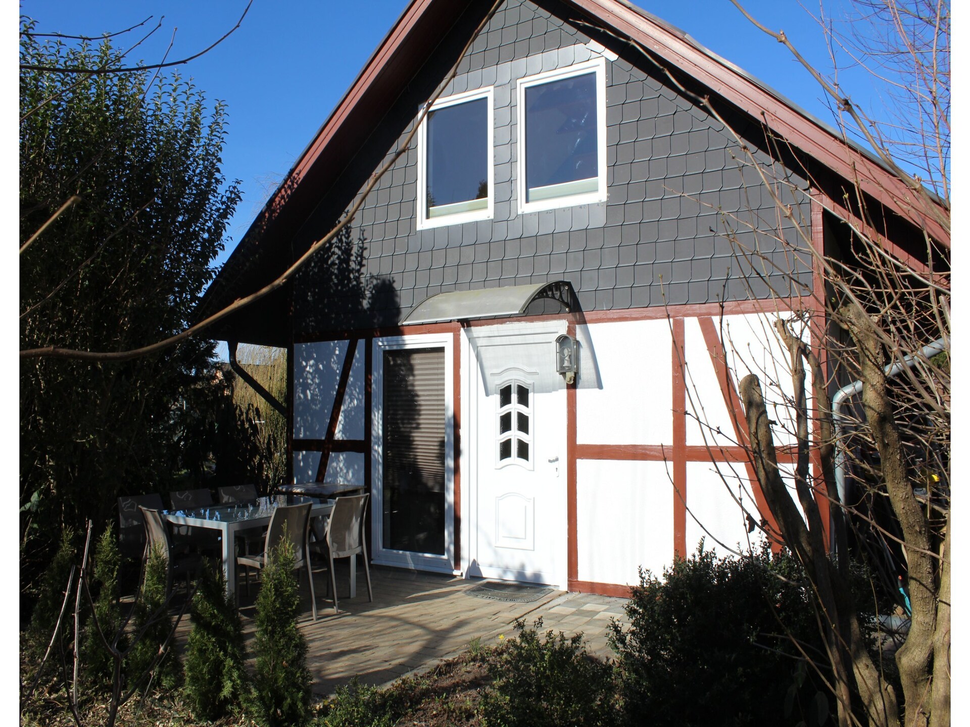 Vrijstaande bungalow aan de golfbaan bij de Oostzee - foto 1