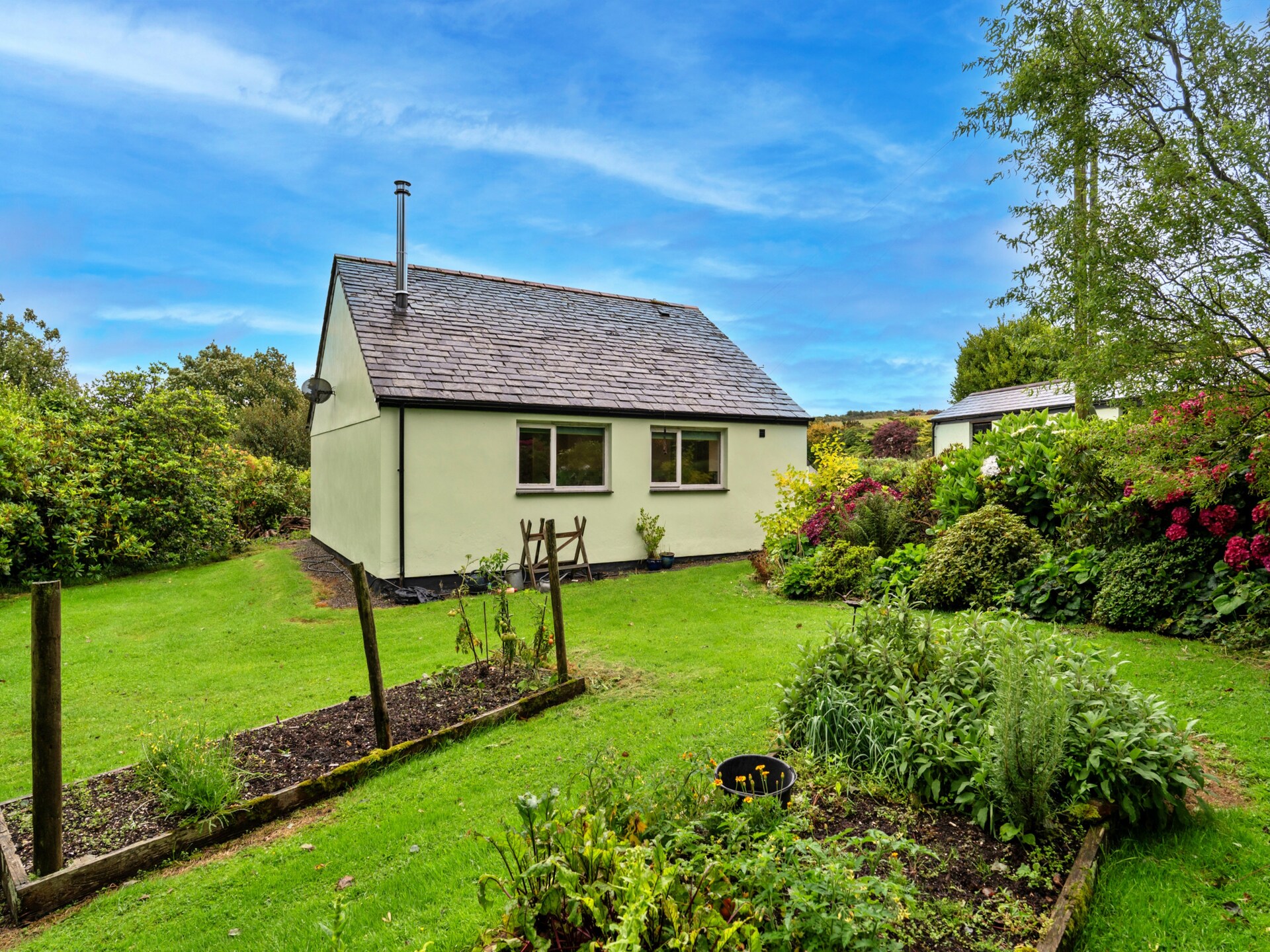 Romantisch chalet Skylarks in het hart van Cornwall met tuin en golfbaan - foto 1