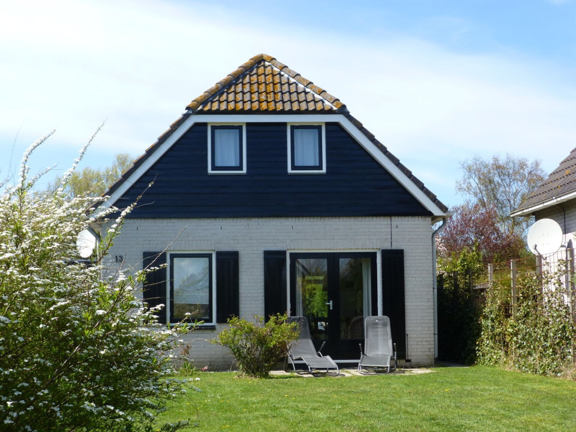 Modern vakantiehuis met tuin, 10 minuten lopen van strand Ouddorp - foto 7