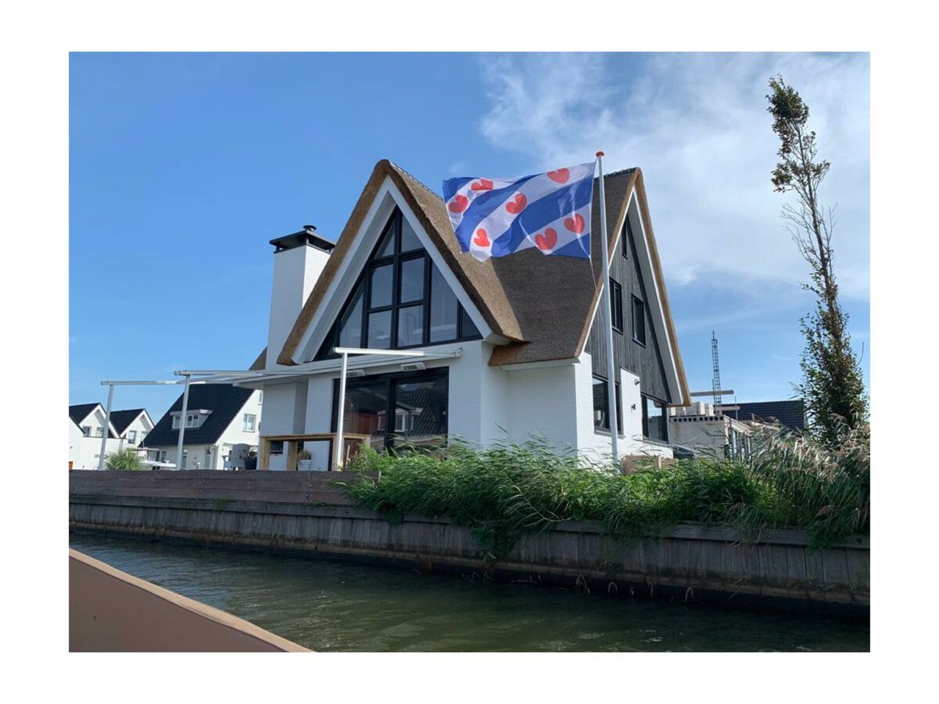 Moderne watervilla met 4 slaapkamers en eigen aanlegsteiger in Stavoren - foto 6