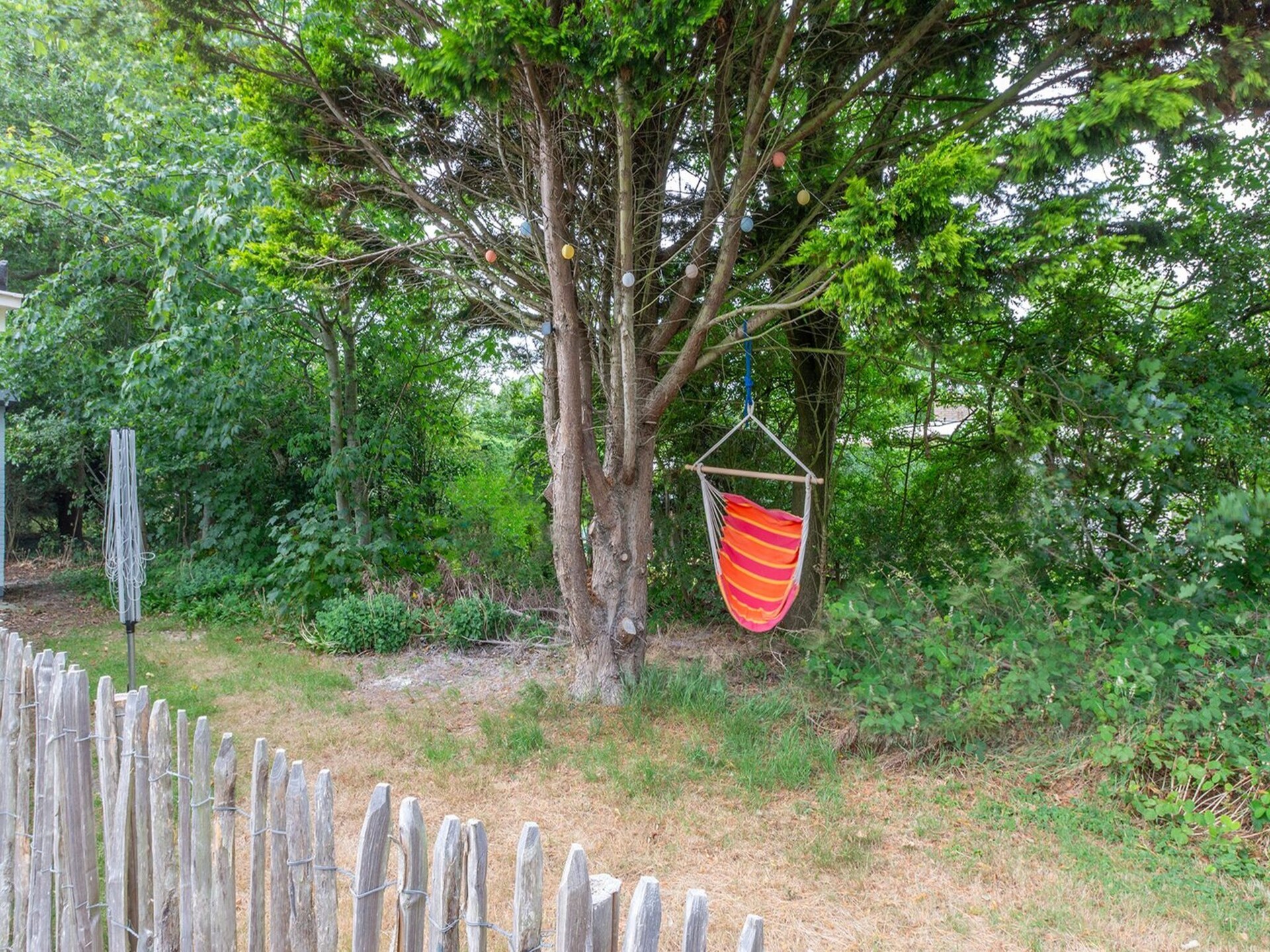 Vrijstaande bungalow met grote tuin op 1,6 km van strand Sint Maartenszee - foto 19